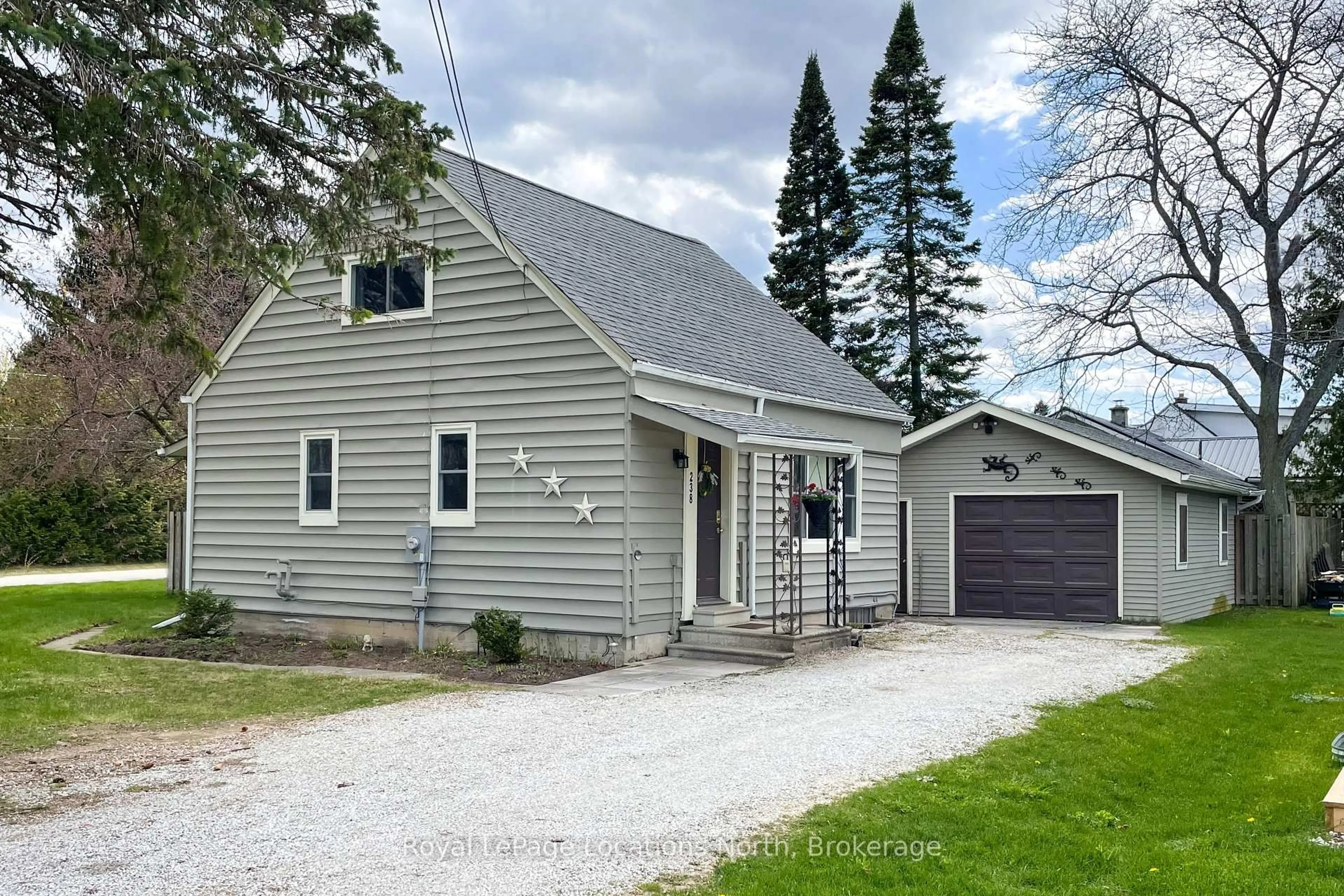 Home with vinyl exterior material, street for 238 Trowbridge St, Meaford Ontario N4L 1M9