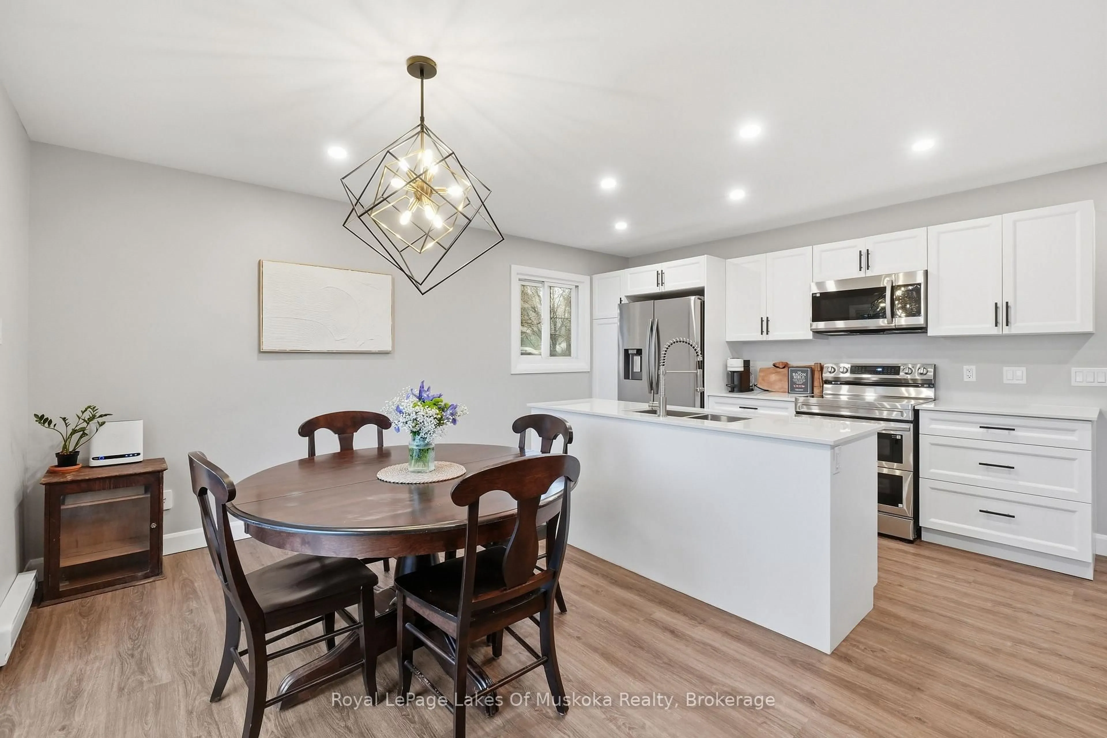 Open concept kitchen, wood/laminate floor for 12 Manominee St, Huntsville Ontario P1H 1H2
