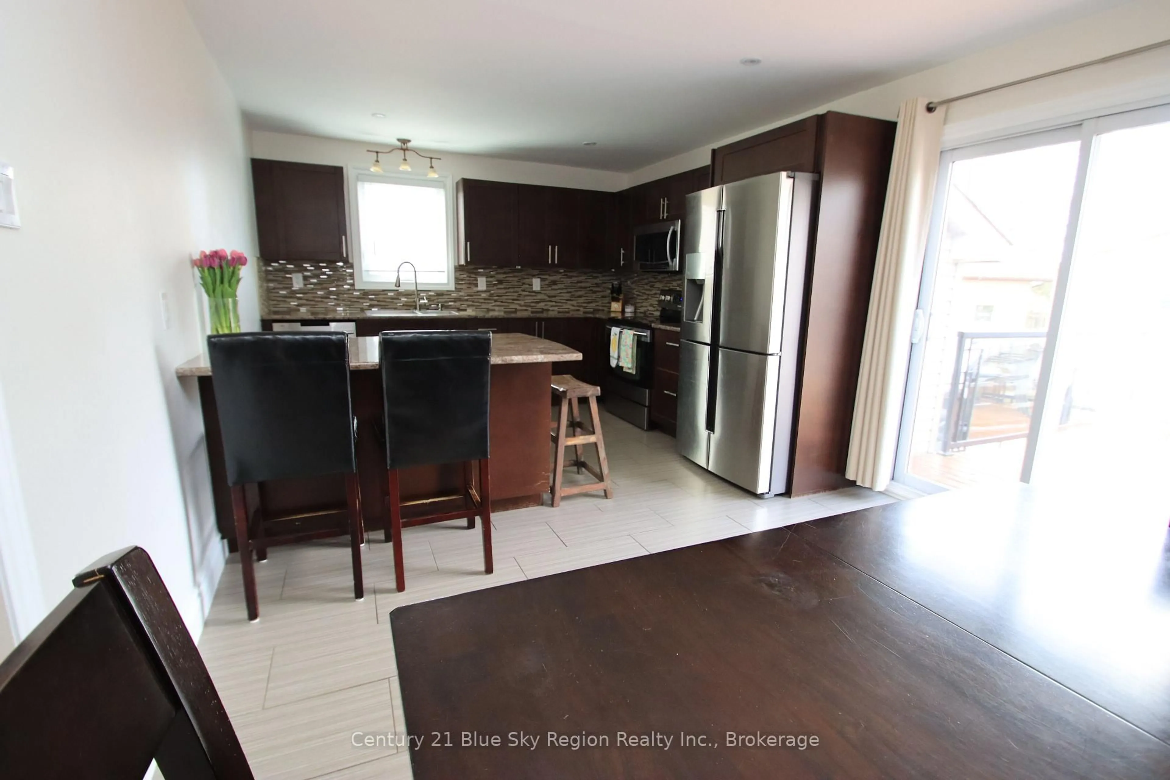 Open concept kitchen, ceramic/tile floor for 127 Bennett St, North Bay Ontario P1B 8X5