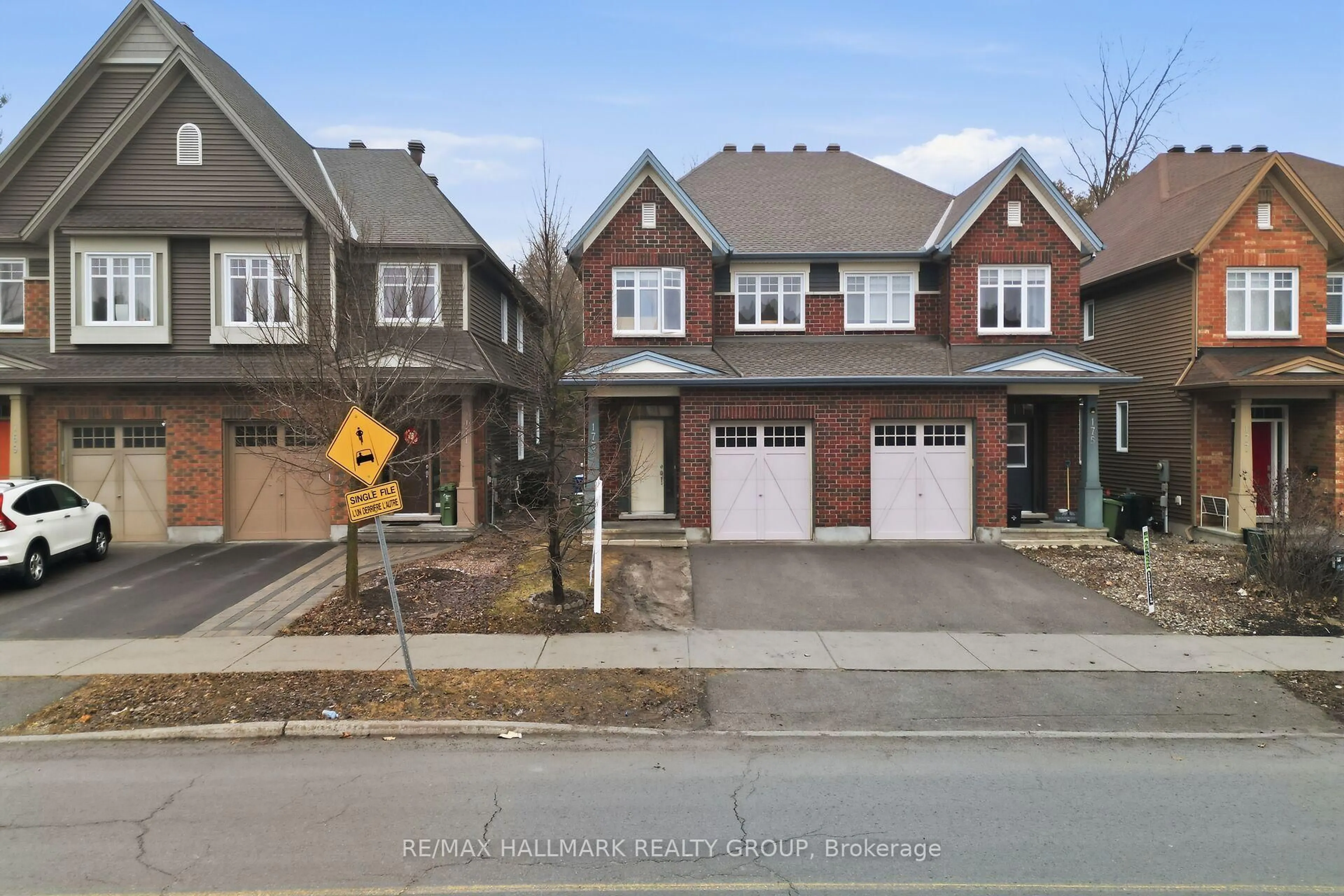 Home with brick exterior material, street for 173 Highbury Park Dr, Ottawa Ontario K2J 5Y1