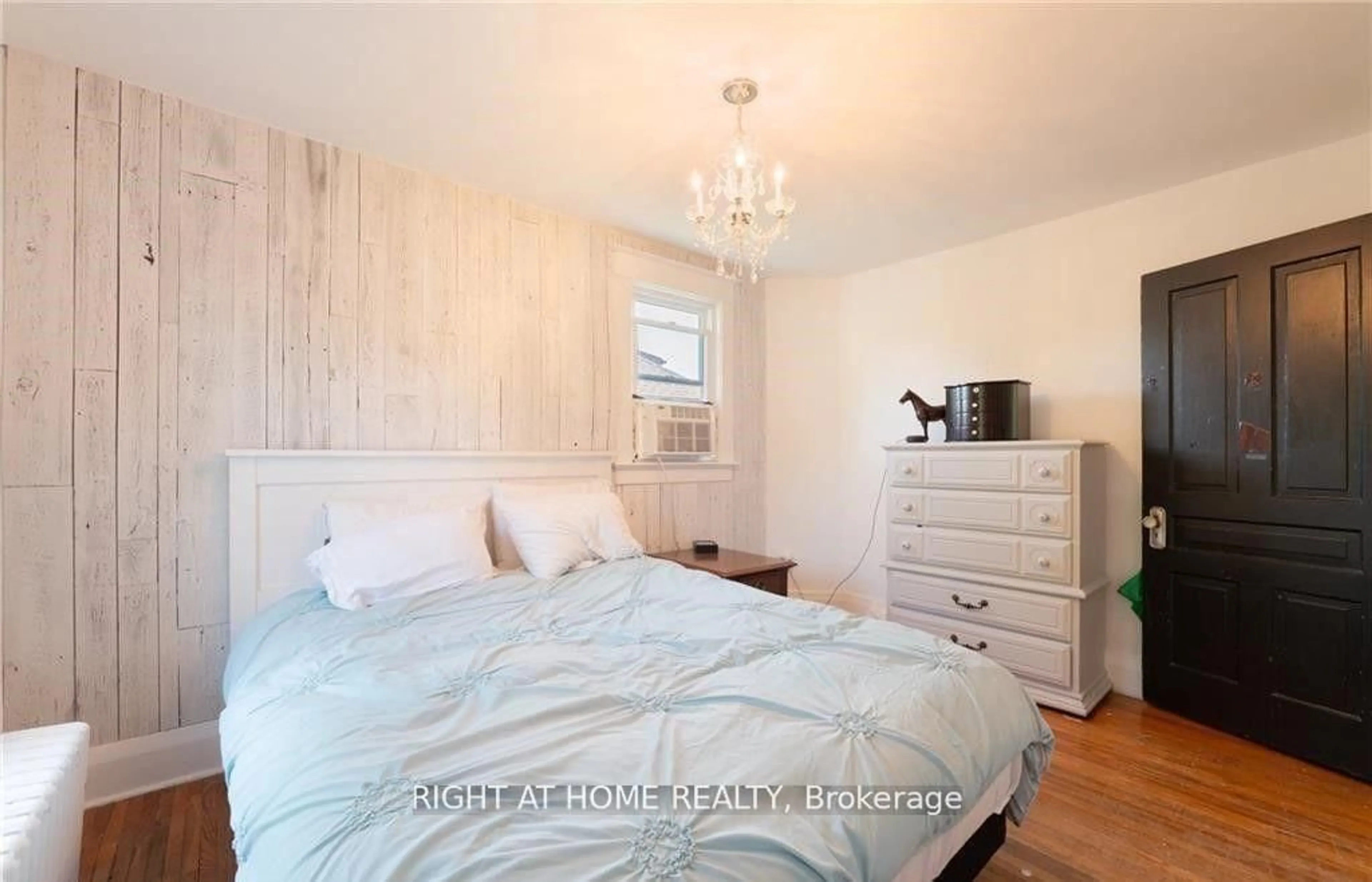 Bedroom with bed, wood/laminate floor for 129 Forest Ave, Port Colborne Ontario L3K 5E5