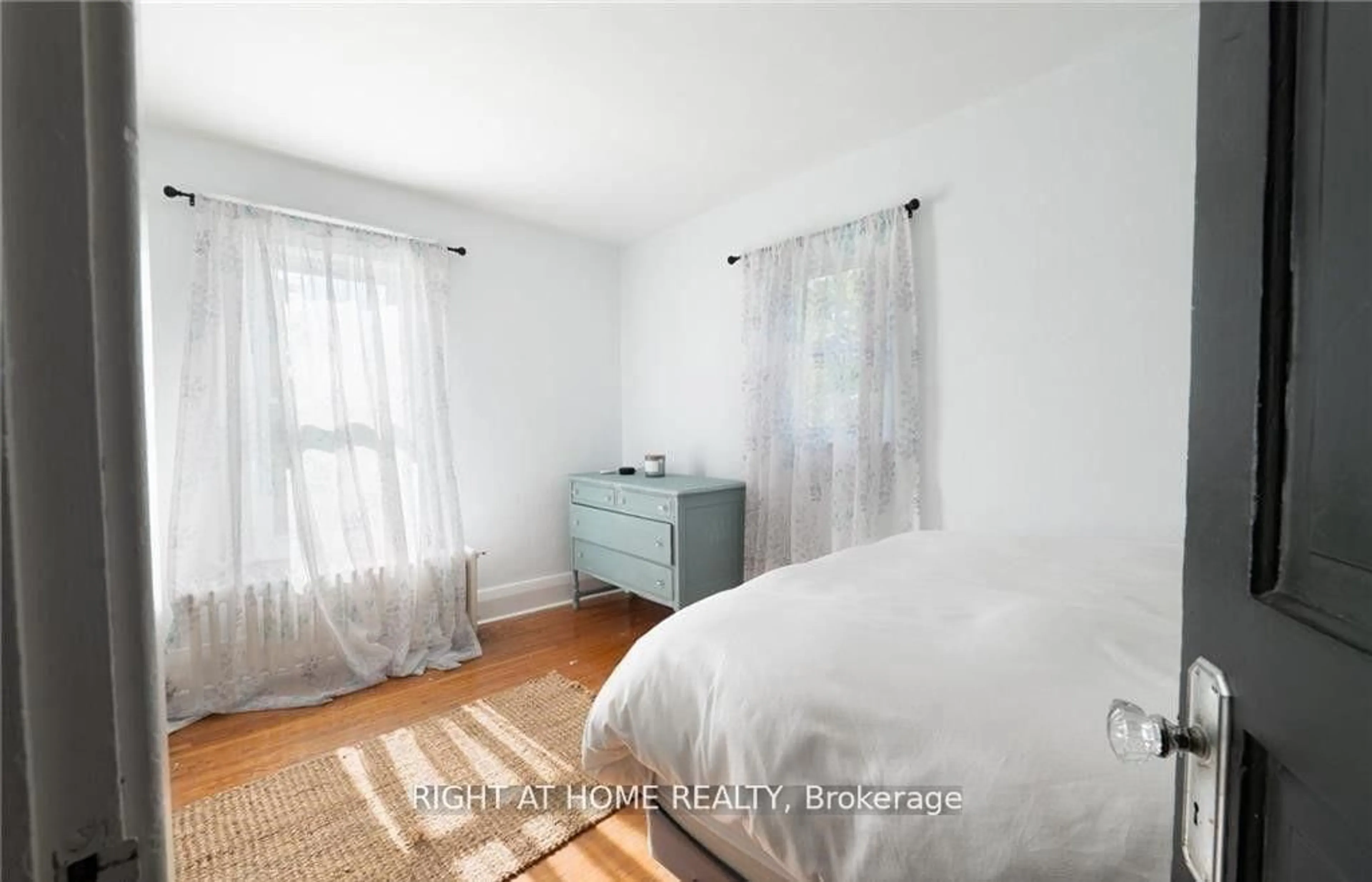 Bedroom with bed, wood/laminate floor for 129 Forest Ave, Port Colborne Ontario L3K 5E5