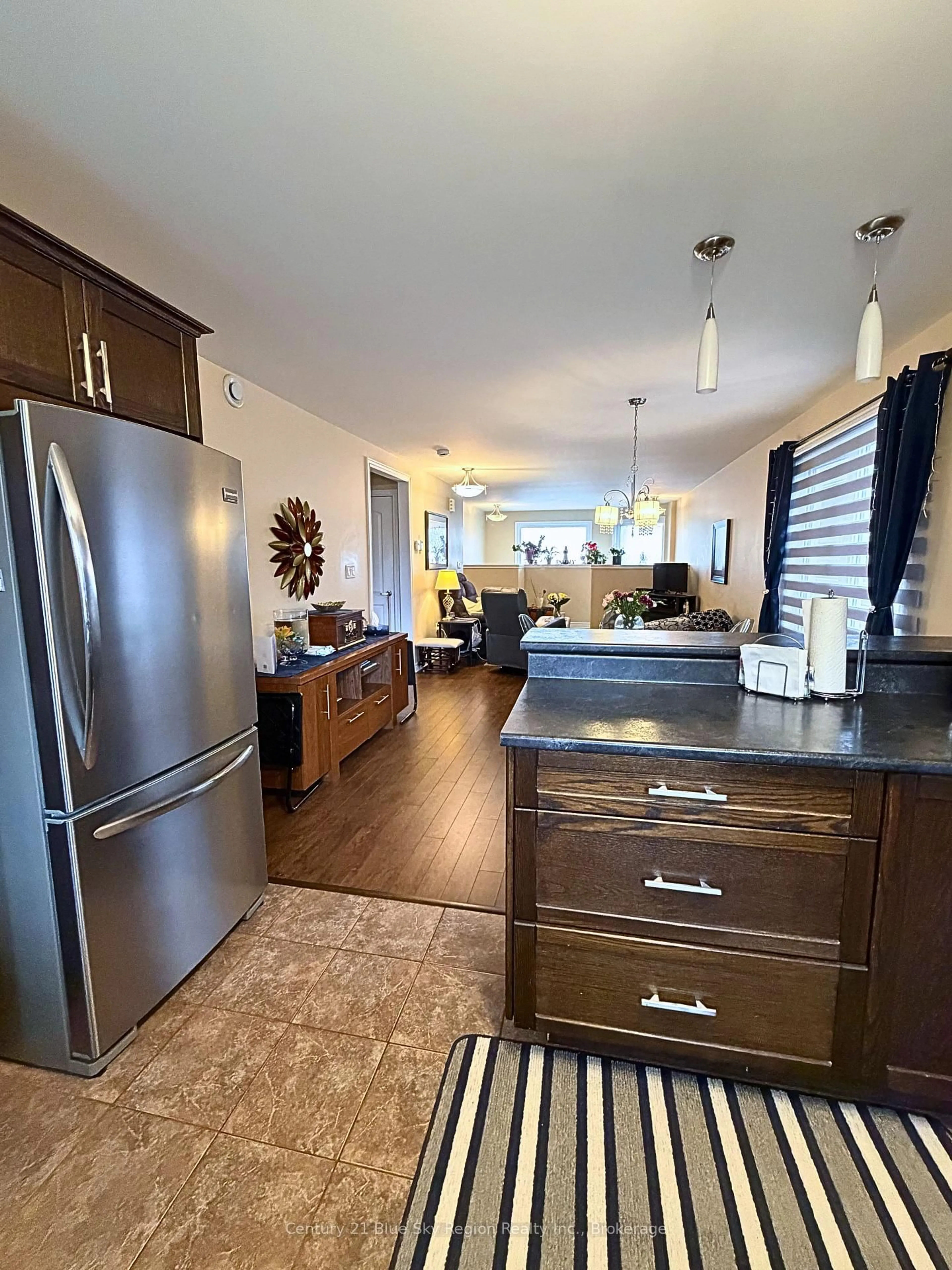 Open concept kitchen, wood/laminate floor for 545 Ann St, North Bay Ontario P1B 5L4