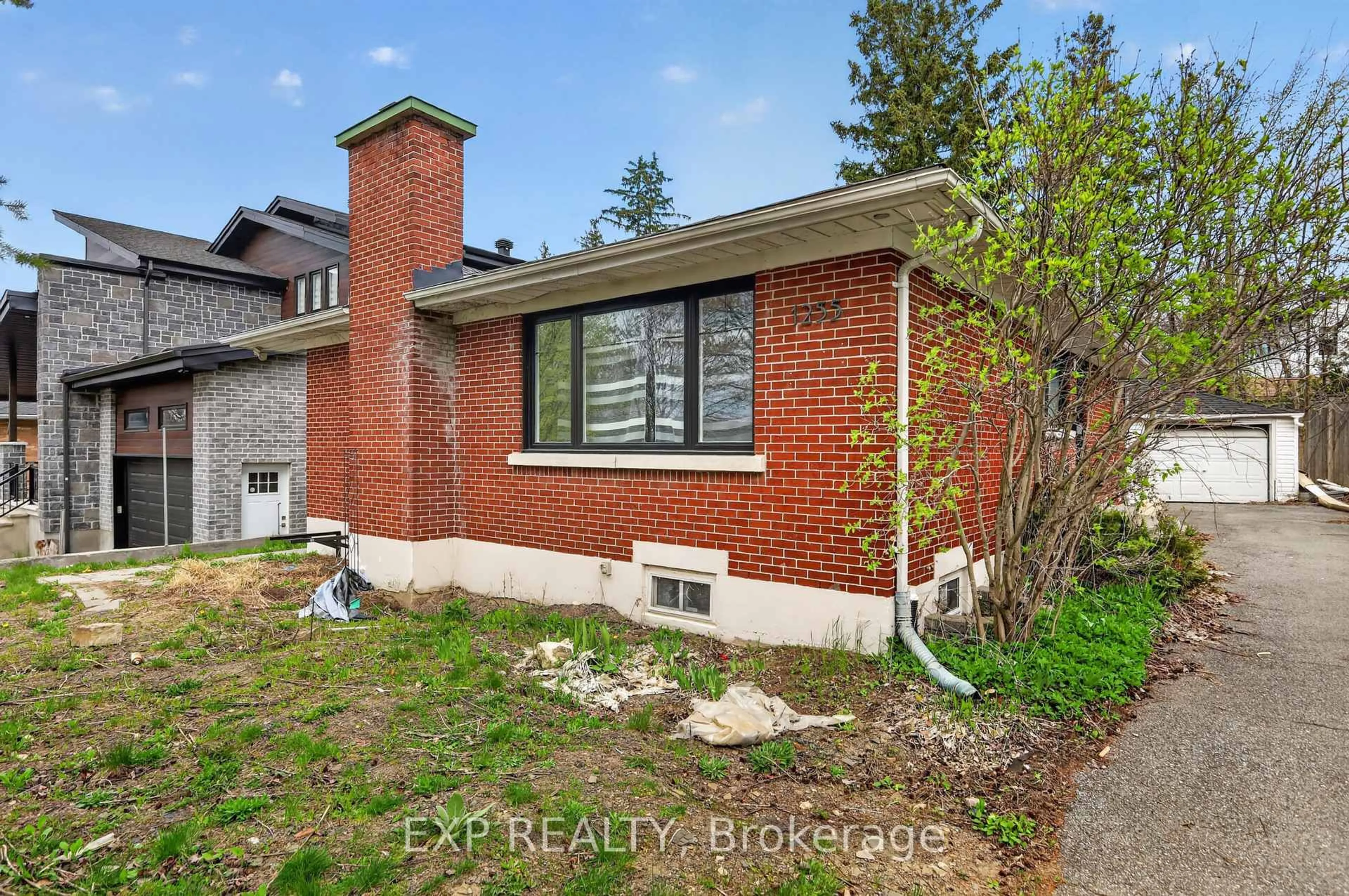 Home with brick exterior material, street for 1255 Evans Blvd, Ottawa Ontario K1H 7T7
