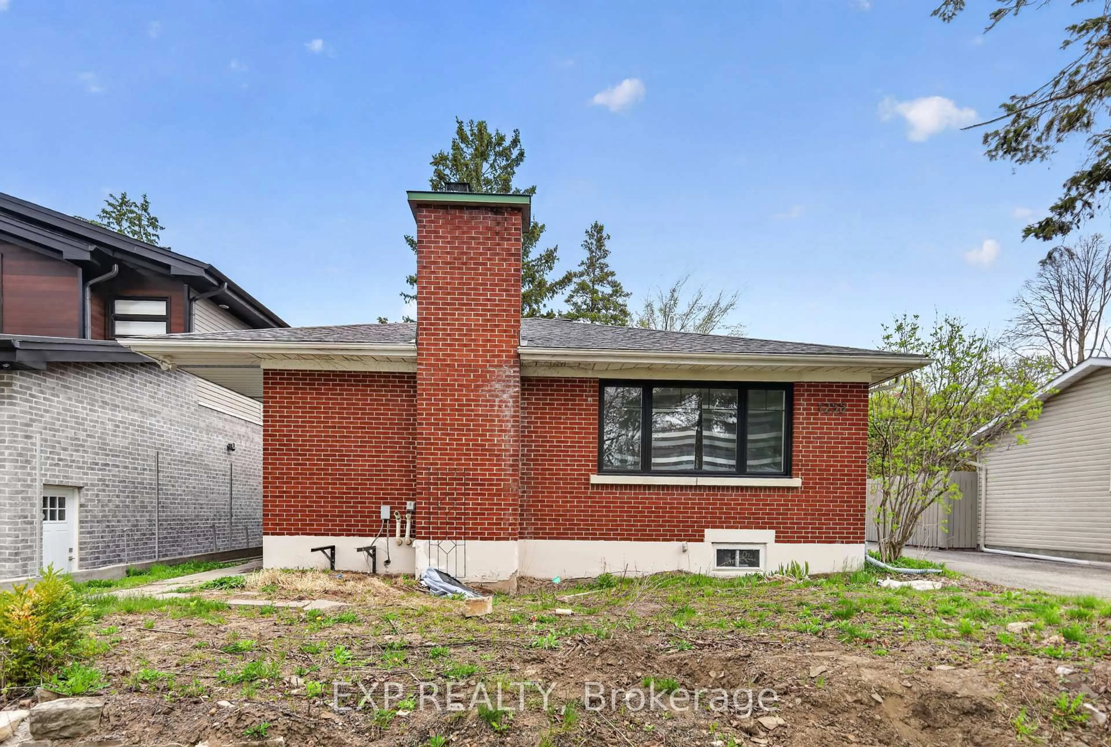 Home with brick exterior material, street for 1255 Evans Blvd, Ottawa Ontario K1H 7T7