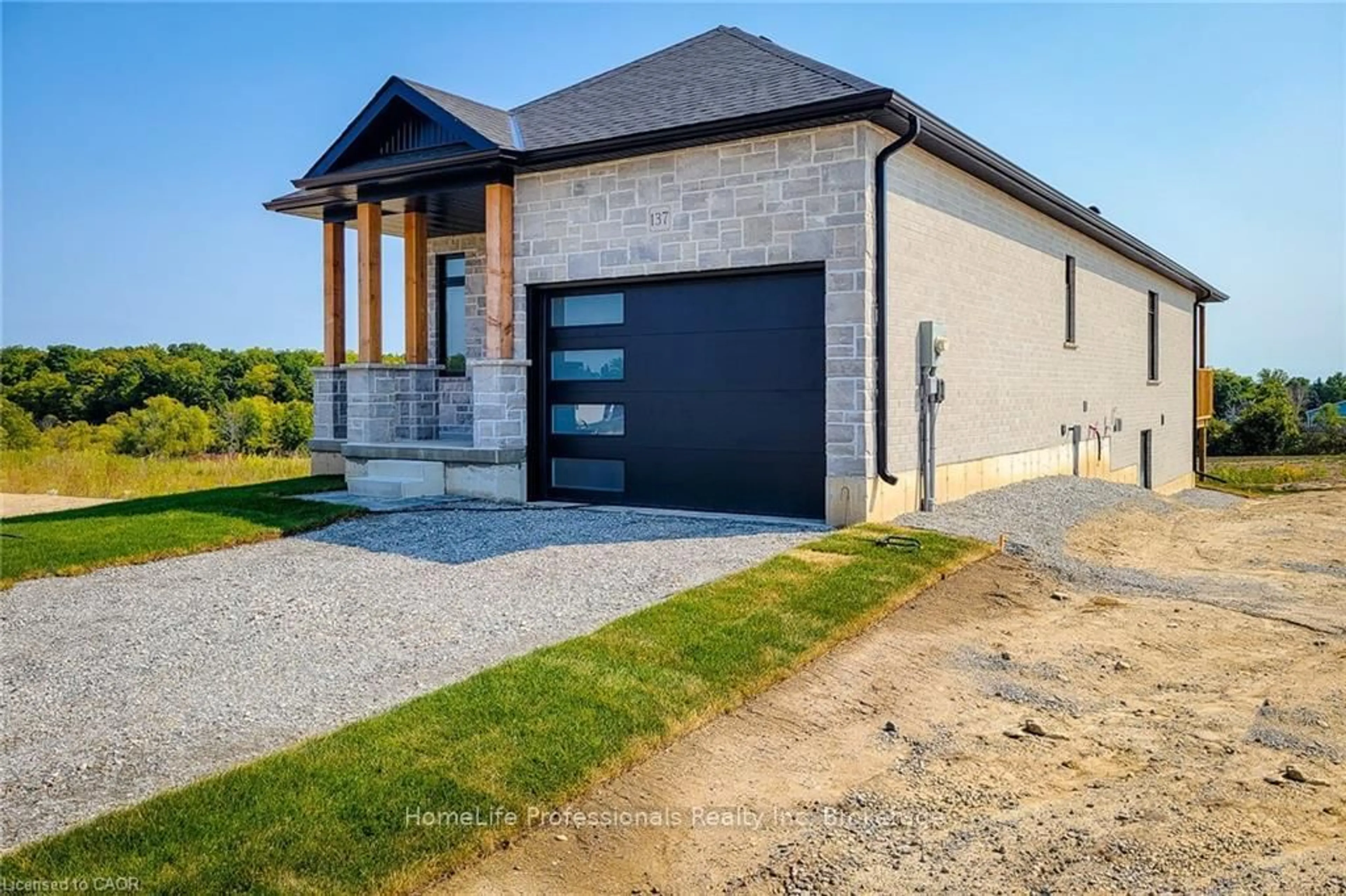Home with brick exterior material, street for 137 PIKE CREEK Dr, Haldimand Ontario N0E 1E0
