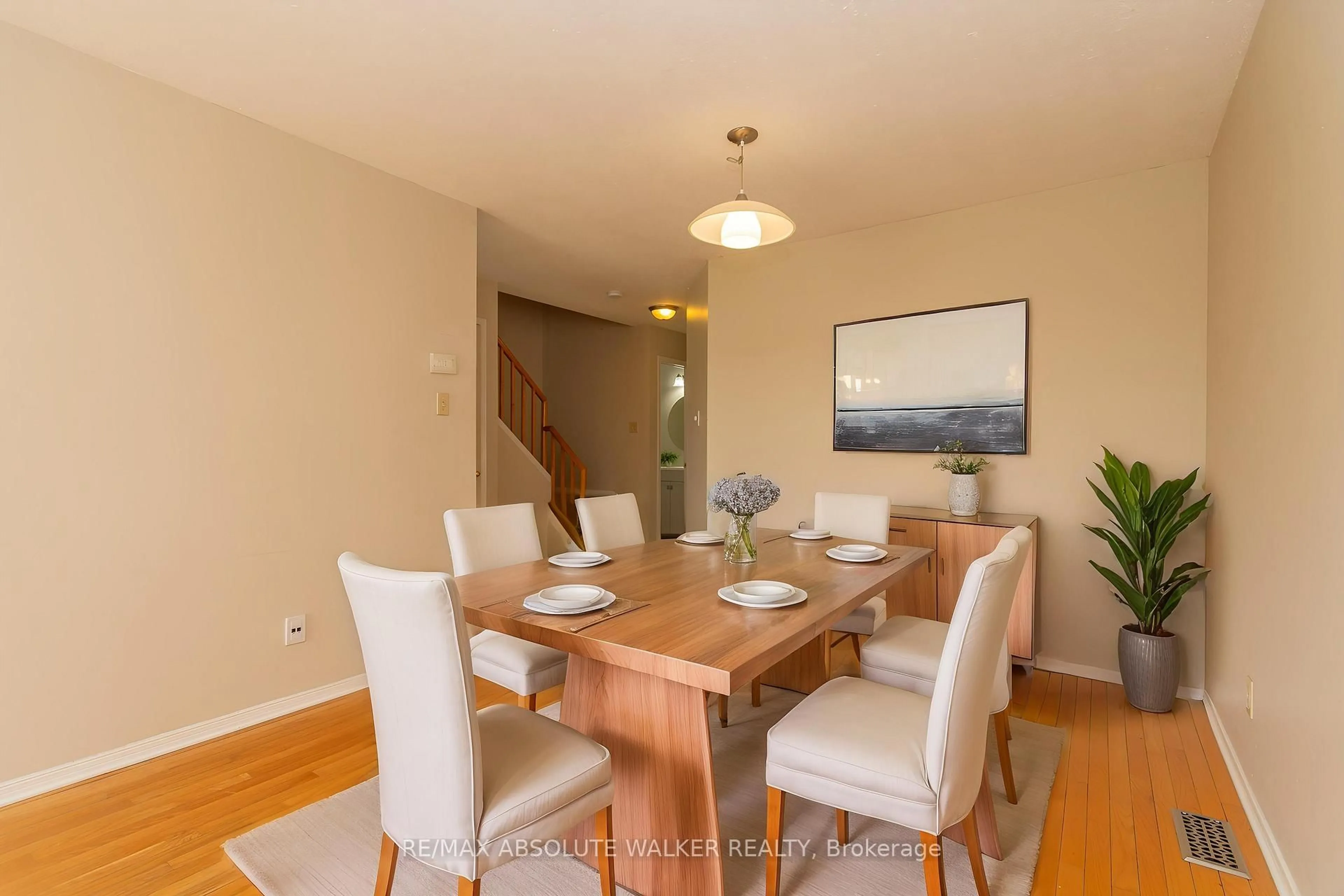 Dining room, wood/laminate floor for 1411 Caravel Cres, Ottawa Ontario K1E 3X4