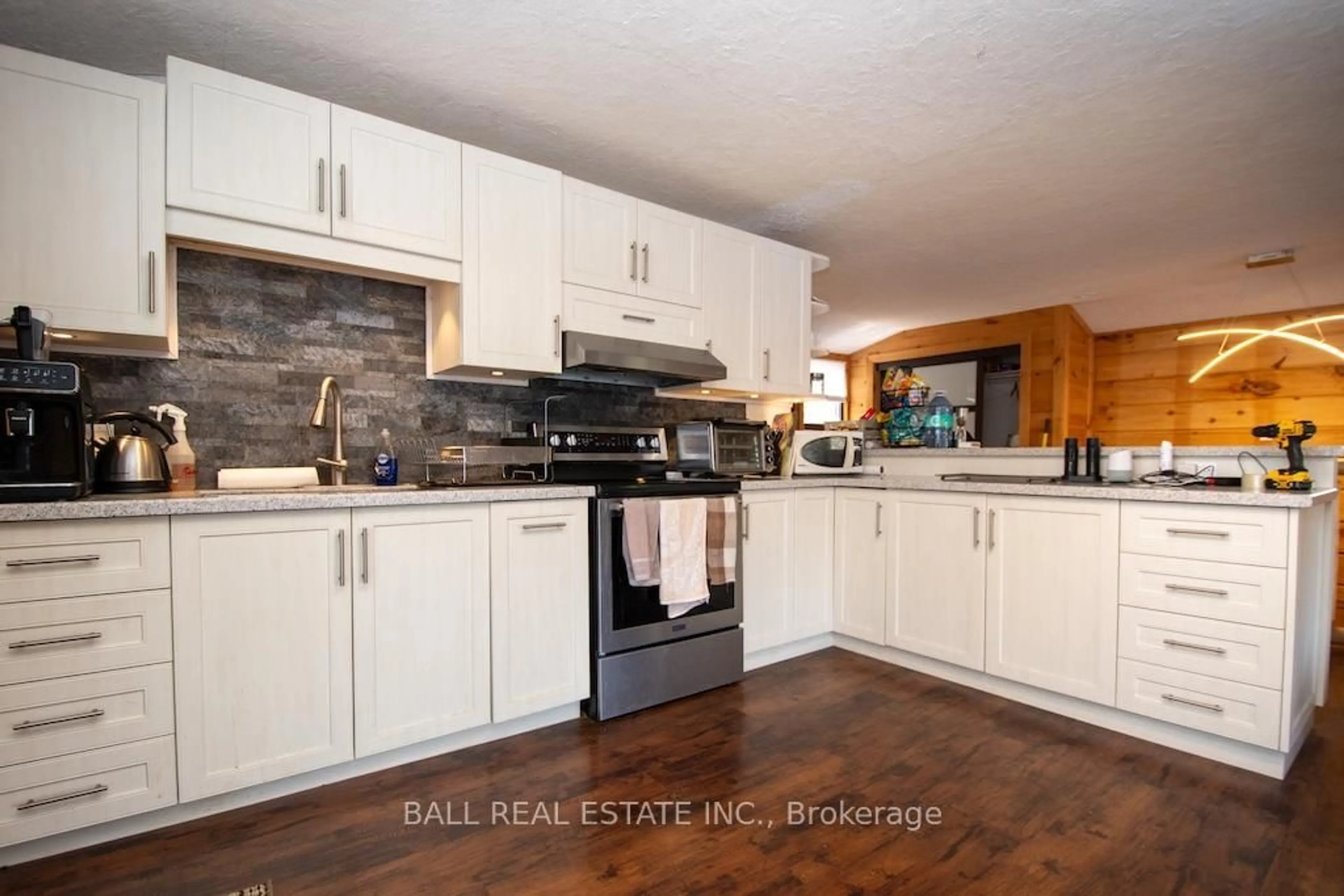 Open concept kitchen, wood/laminate floor for 388 Island 38 Kasshabog Lake, Havelock-Belmont-Methuen Ontario K0L 1Z0