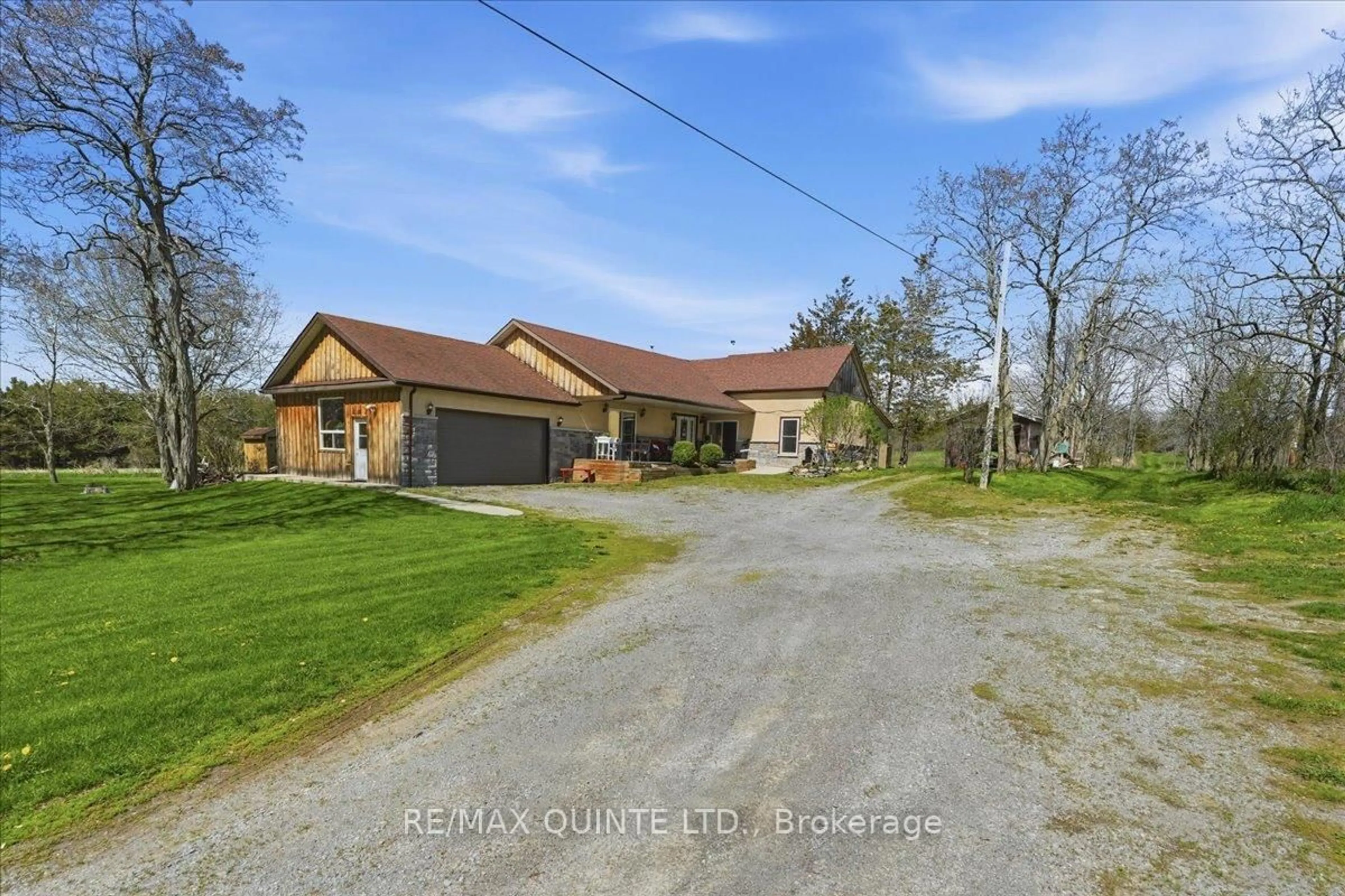 A pic from outside/outdoor area/front of a property/back of a property/a pic from drone, street for 1686 County Road 13, Prince Edward County Ontario K0K 2P0