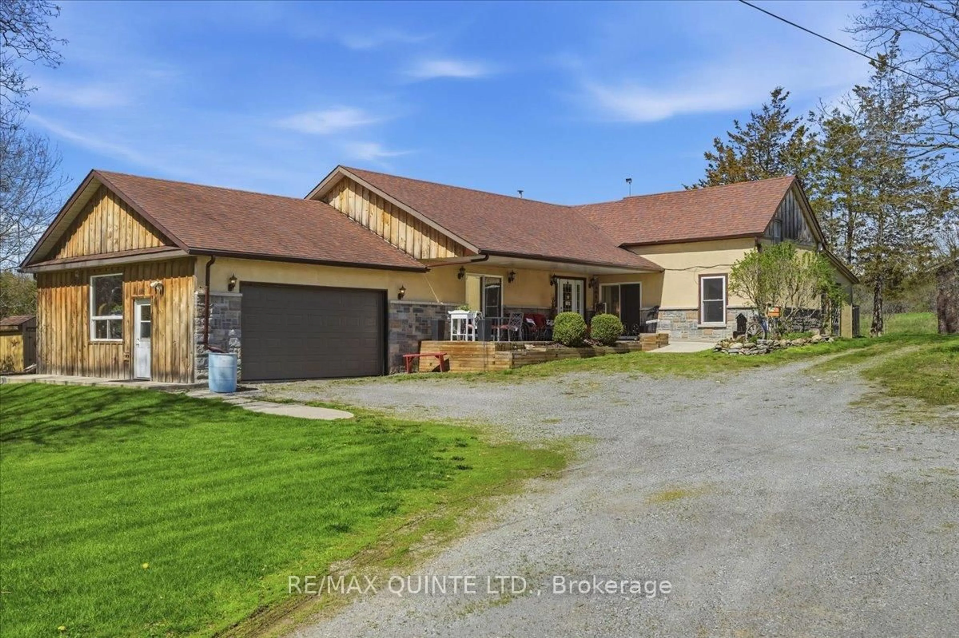 A pic from outside/outdoor area/front of a property/back of a property/a pic from drone, street for 1686 County Road 13, Prince Edward County Ontario K0K 2P0