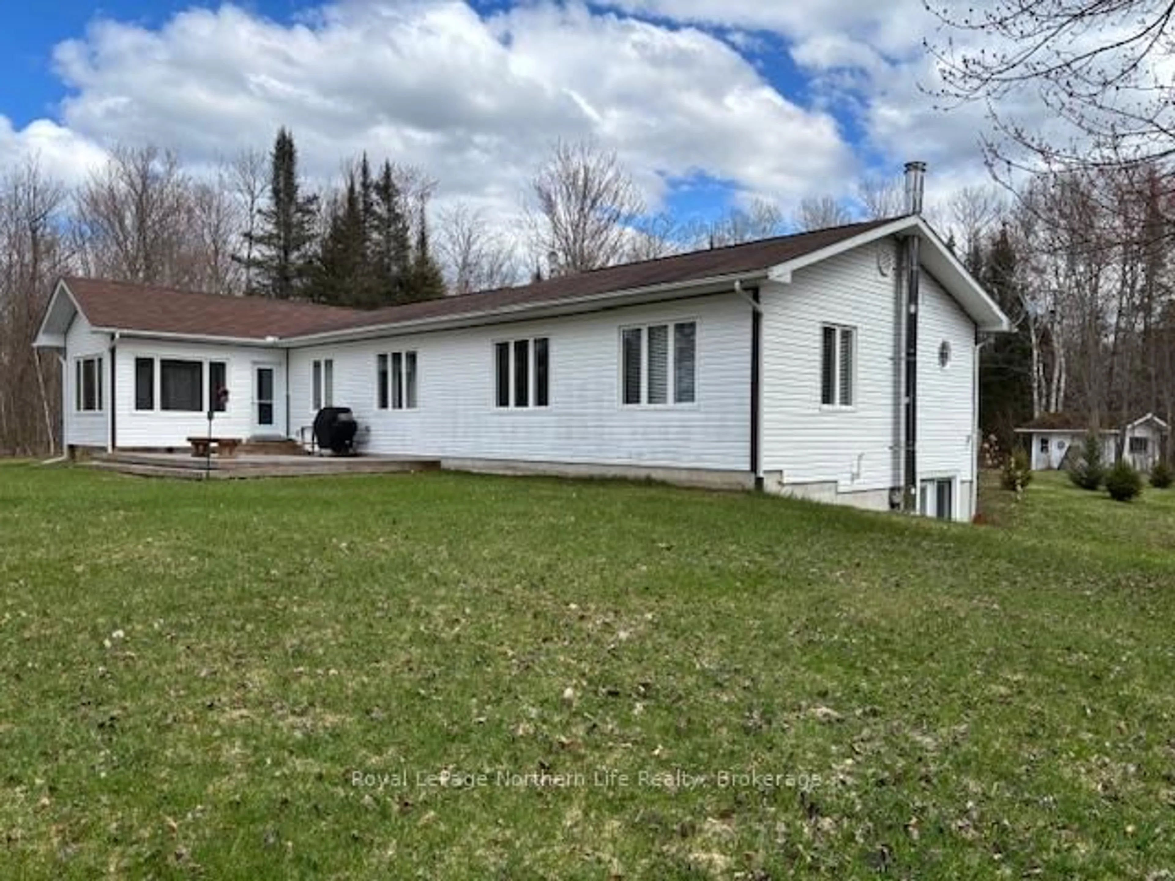 A pic from outside/outdoor area/front of a property/back of a property/a pic from drone, unknown for 607 Farmers Line, Bonfield Ontario P0H 2E0