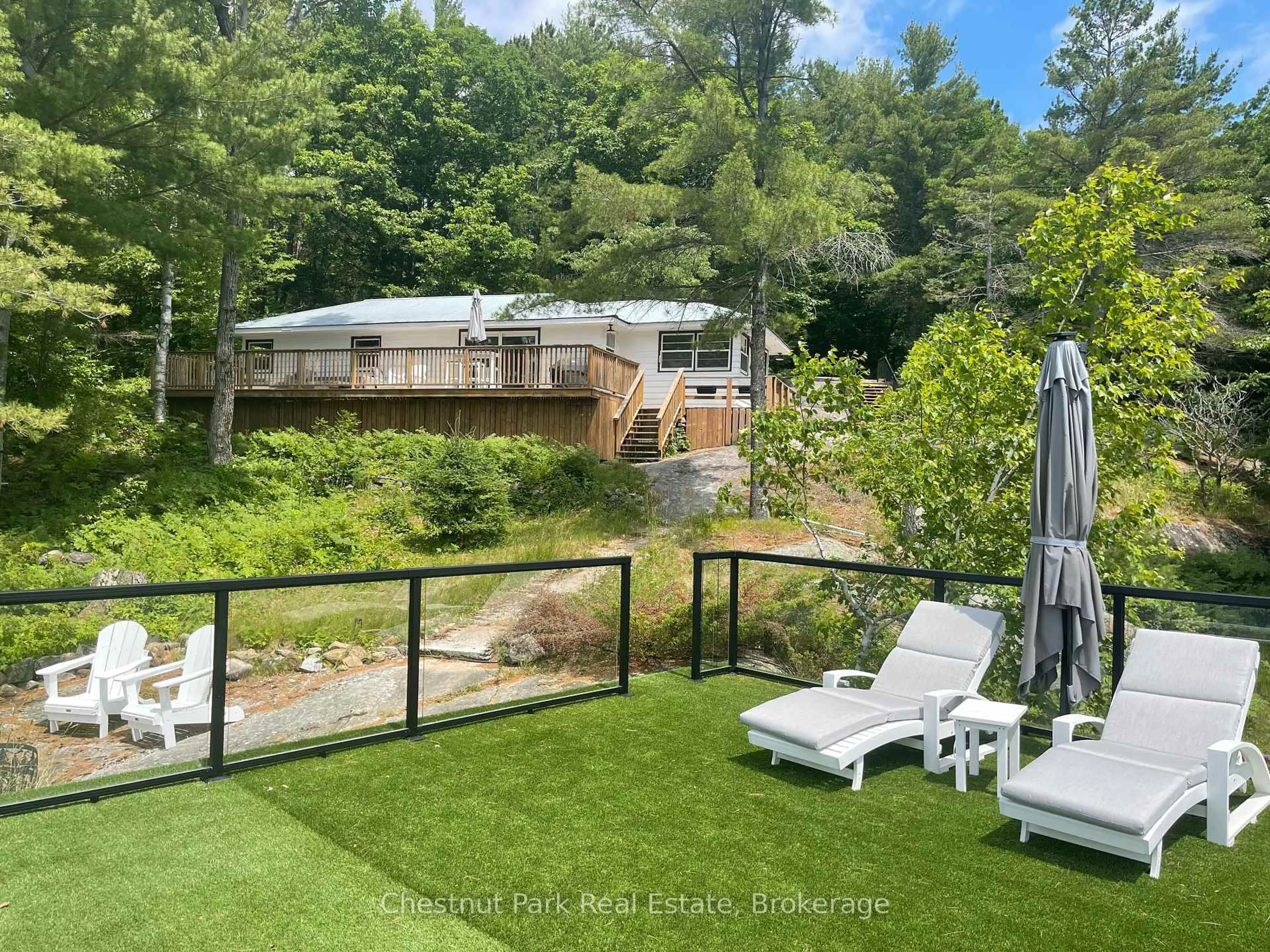 A pic from outside/outdoor area/front of a property/back of a property/a pic from drone, water/lake/river/ocean view for 117 STEELES Rd, Seguin Ontario P0C 1J0