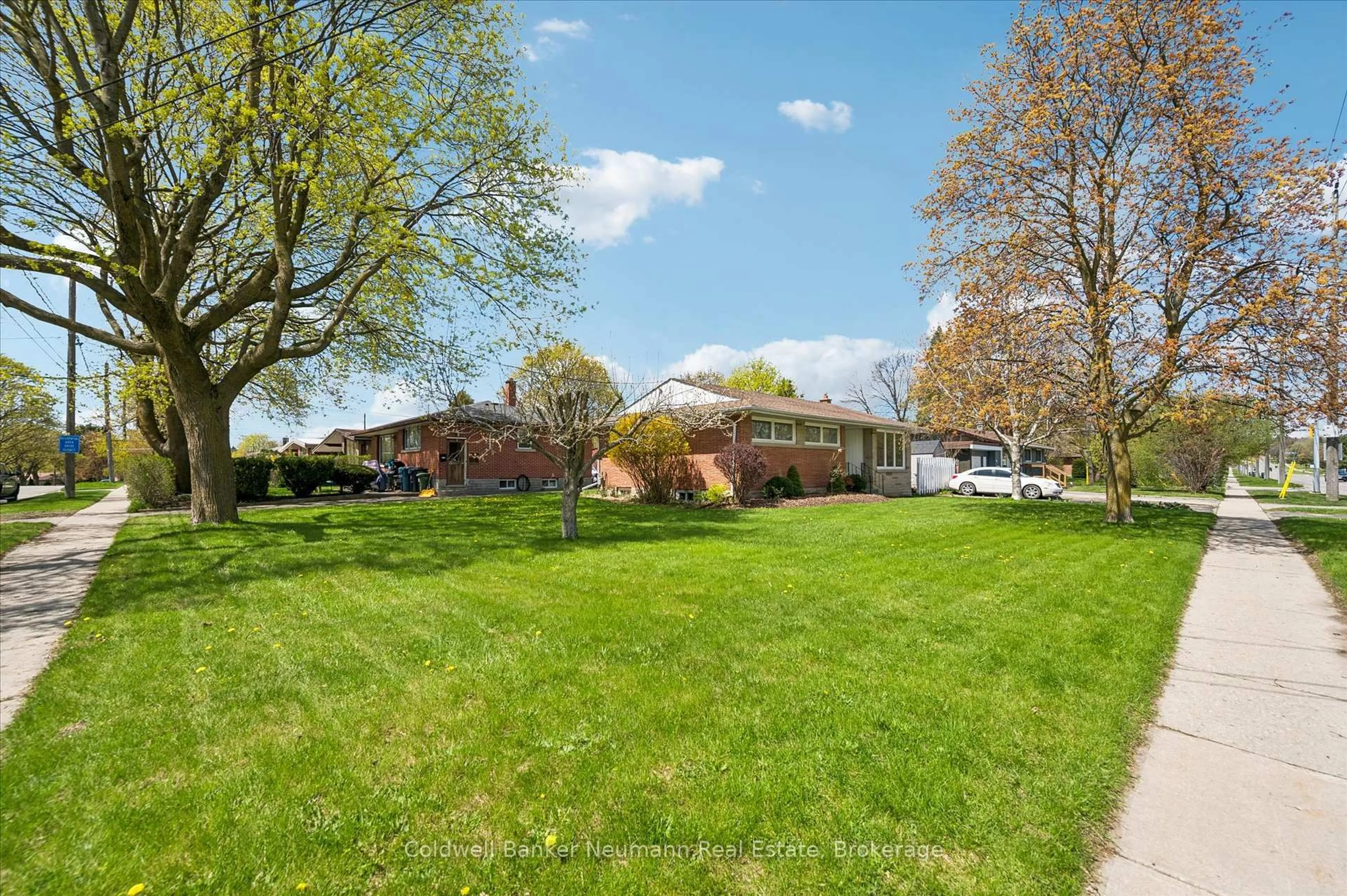 A pic from outside/outdoor area/front of a property/back of a property/a pic from drone, water/lake/river/ocean view for 92 Victoria Rd, Guelph Ontario N1E 5H2