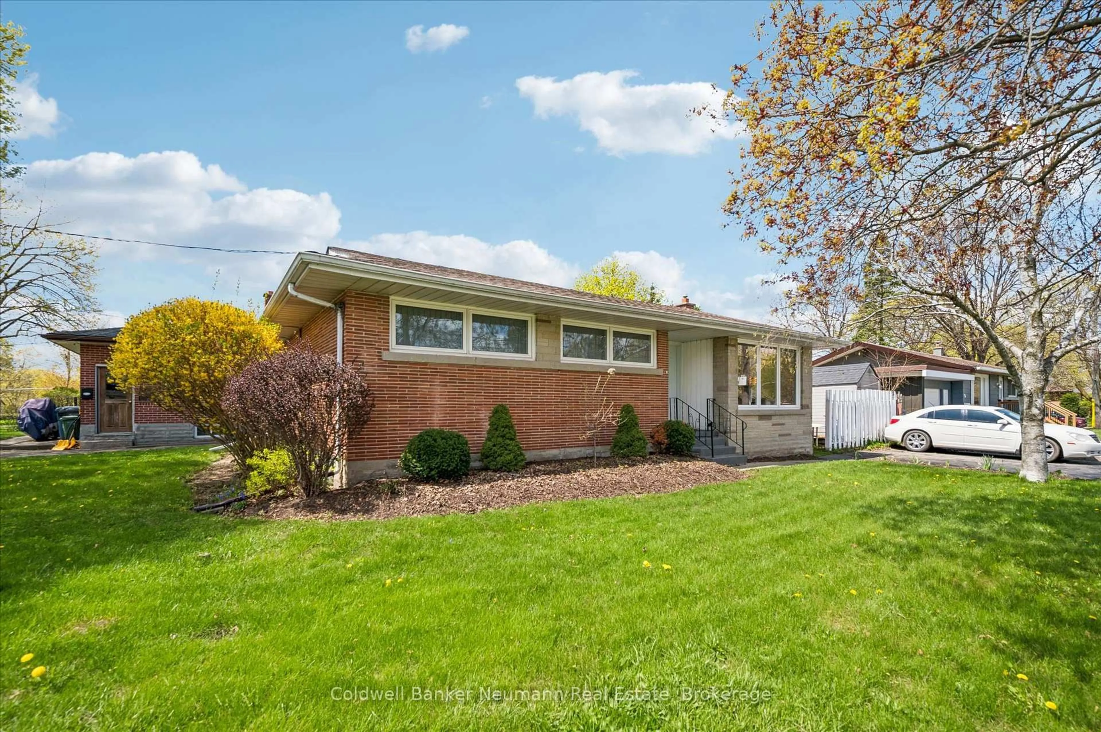 Home with brick exterior material, street for 92 Victoria Rd, Guelph Ontario N1E 5H2