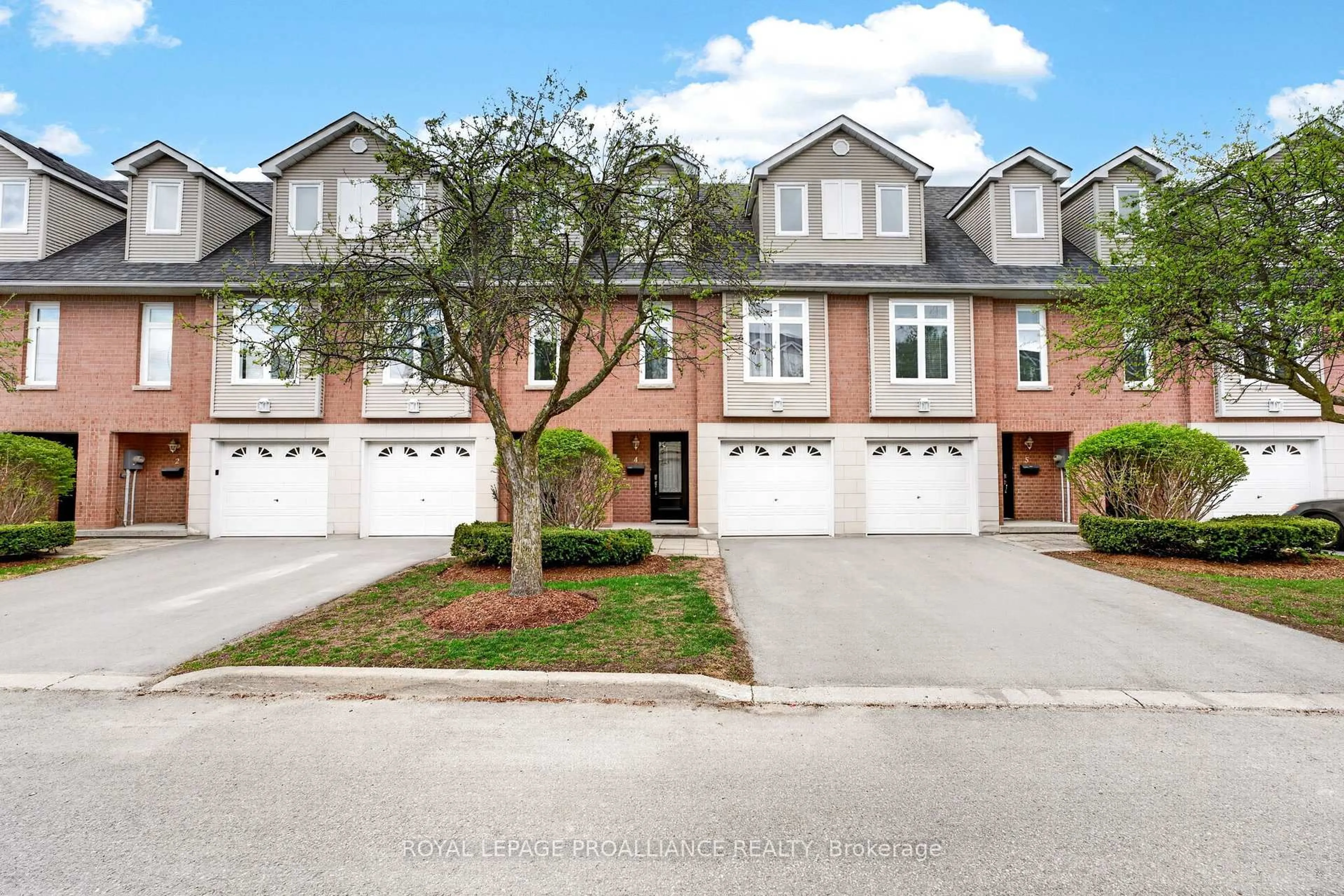 A pic from outside/outdoor area/front of a property/back of a property/a pic from drone, street for 9 Progress Ave #4, Belleville Ontario K8P 4Z3