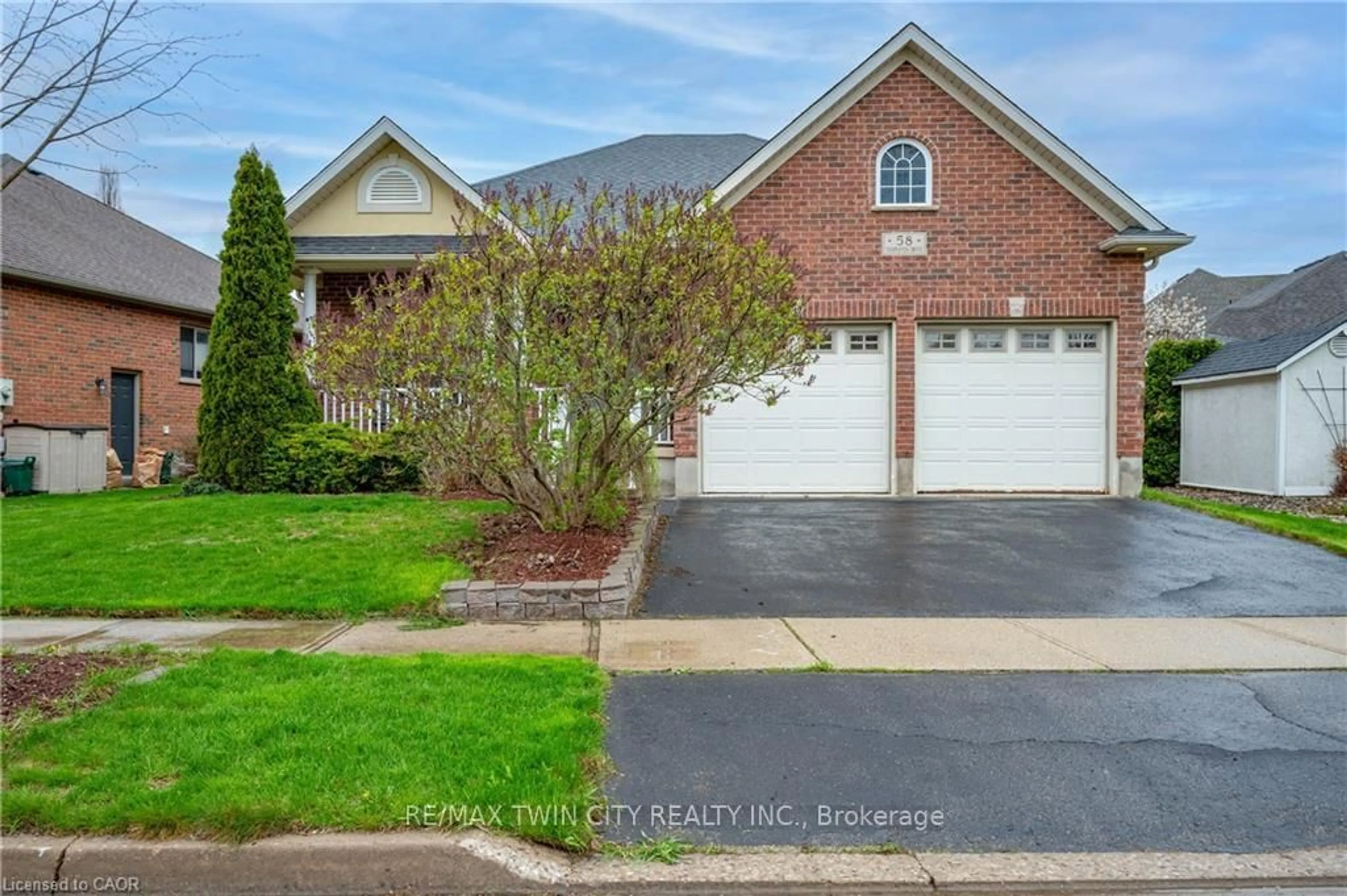 Home with brick exterior material, street for 58 Templeton Dr, Kitchener Ontario N2A 4G1