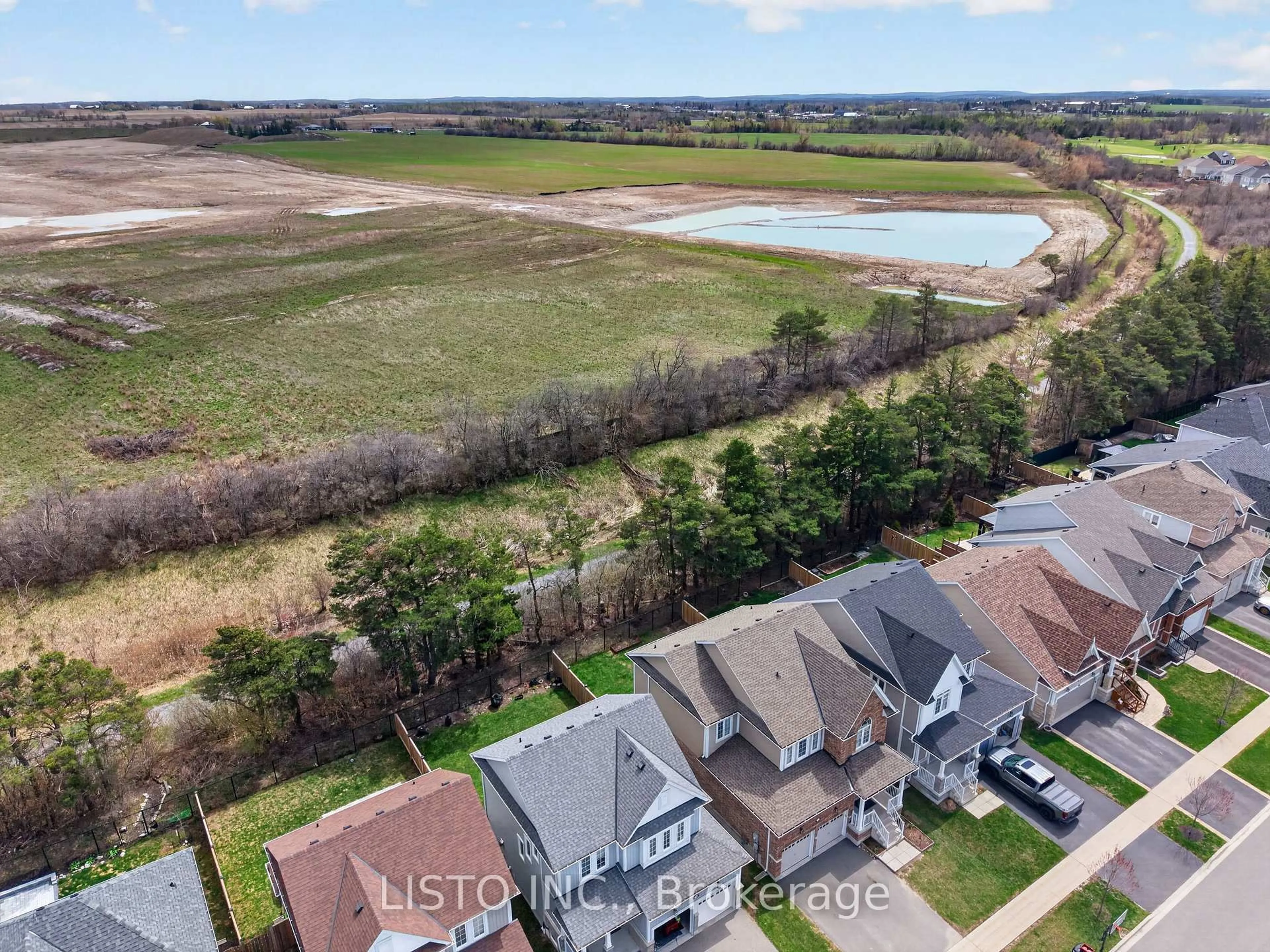 A pic from outside/outdoor area/front of a property/back of a property/a pic from drone, water/lake/river/ocean view for 15 Primeau Cres, Kawartha Lakes Ontario K9V 0M6