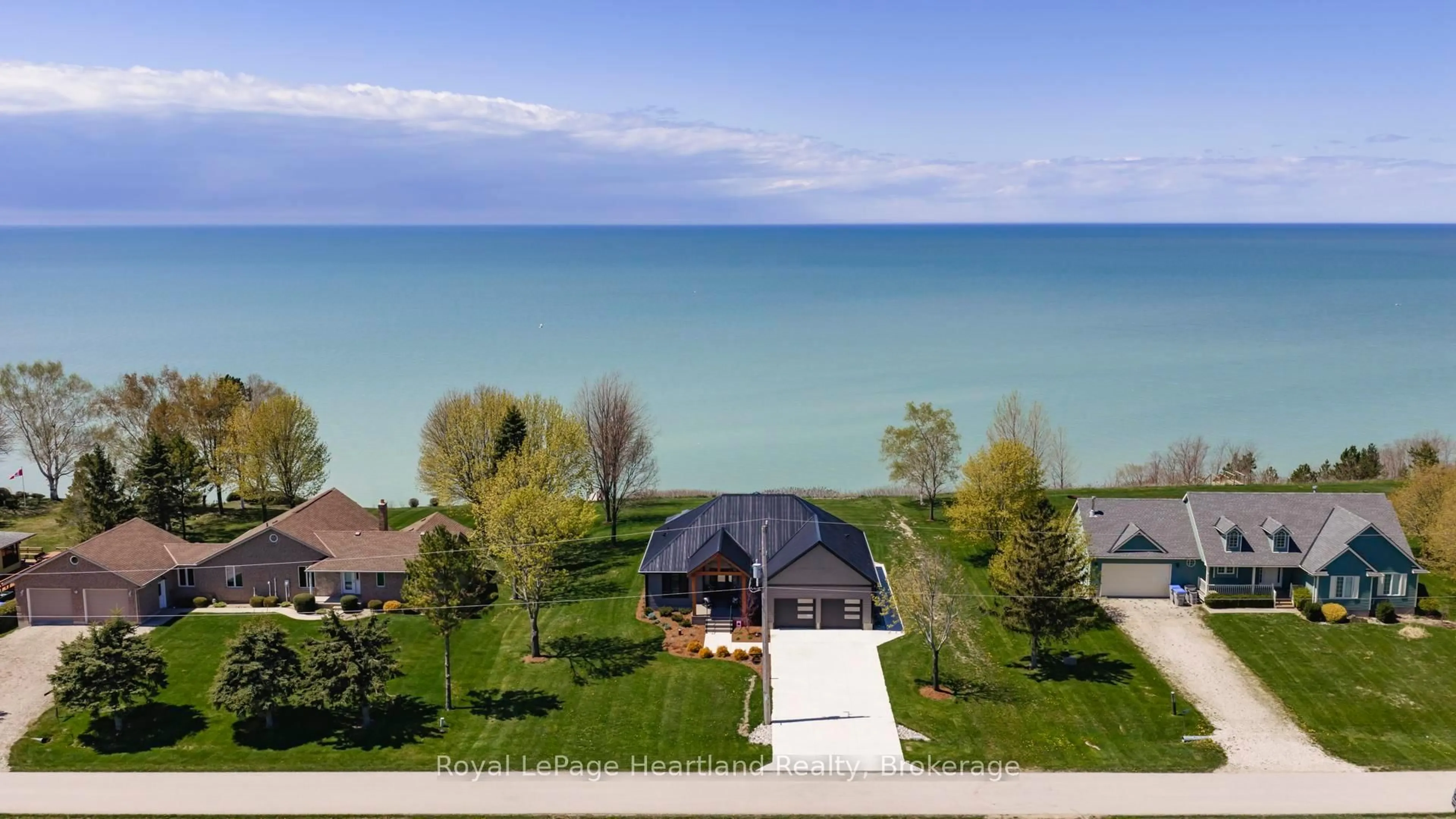 A pic from outside/outdoor area/front of a property/back of a property/a pic from drone, water/lake/river/ocean view for 77961 Dryden Lane, Central Huron Ontario N0M 1G0