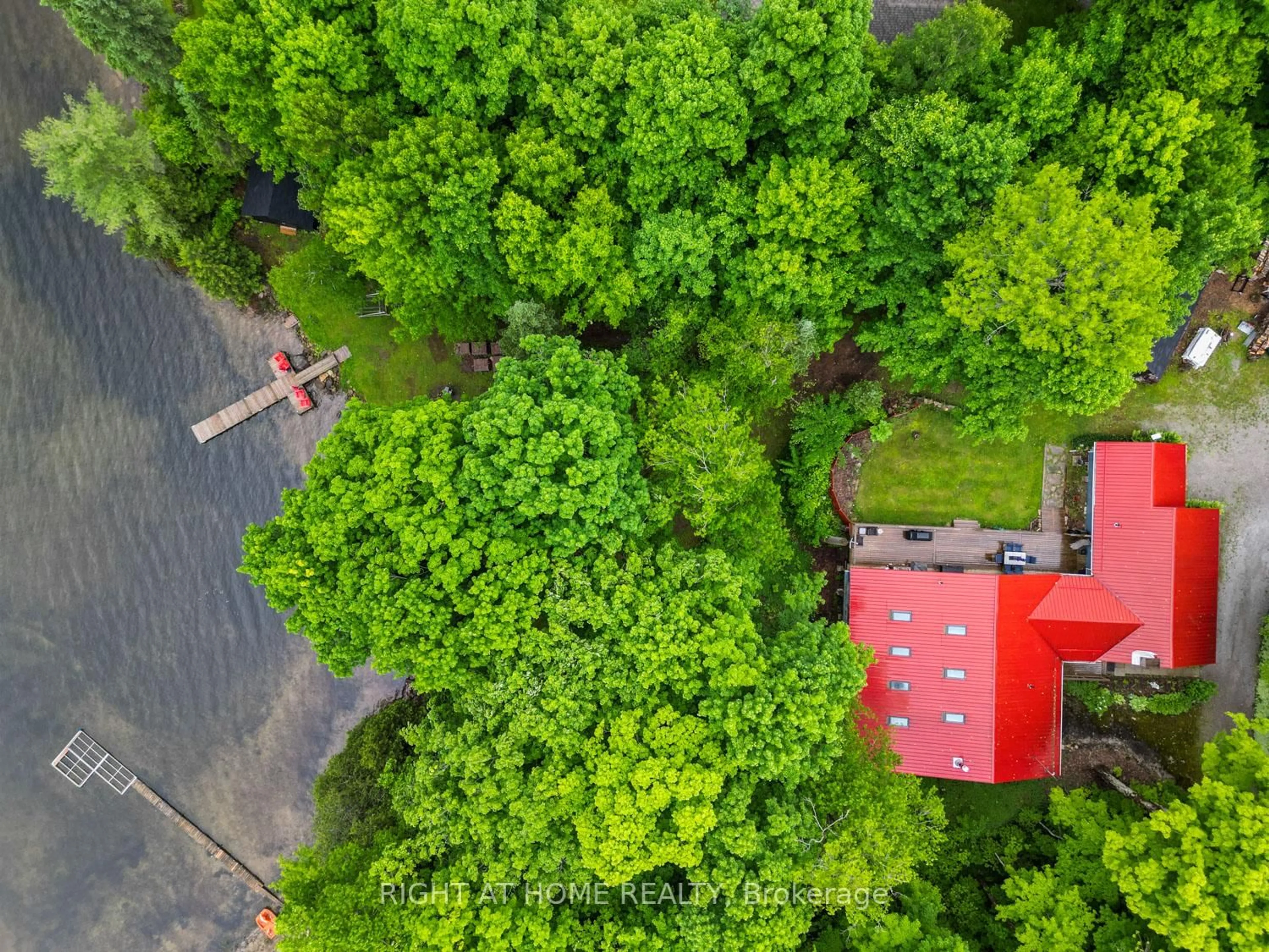 A pic from outside/outdoor area/front of a property/back of a property/a pic from drone, forest/trees view for 96 Suter Dr, Kawartha Lakes Ontario K0M 2B0