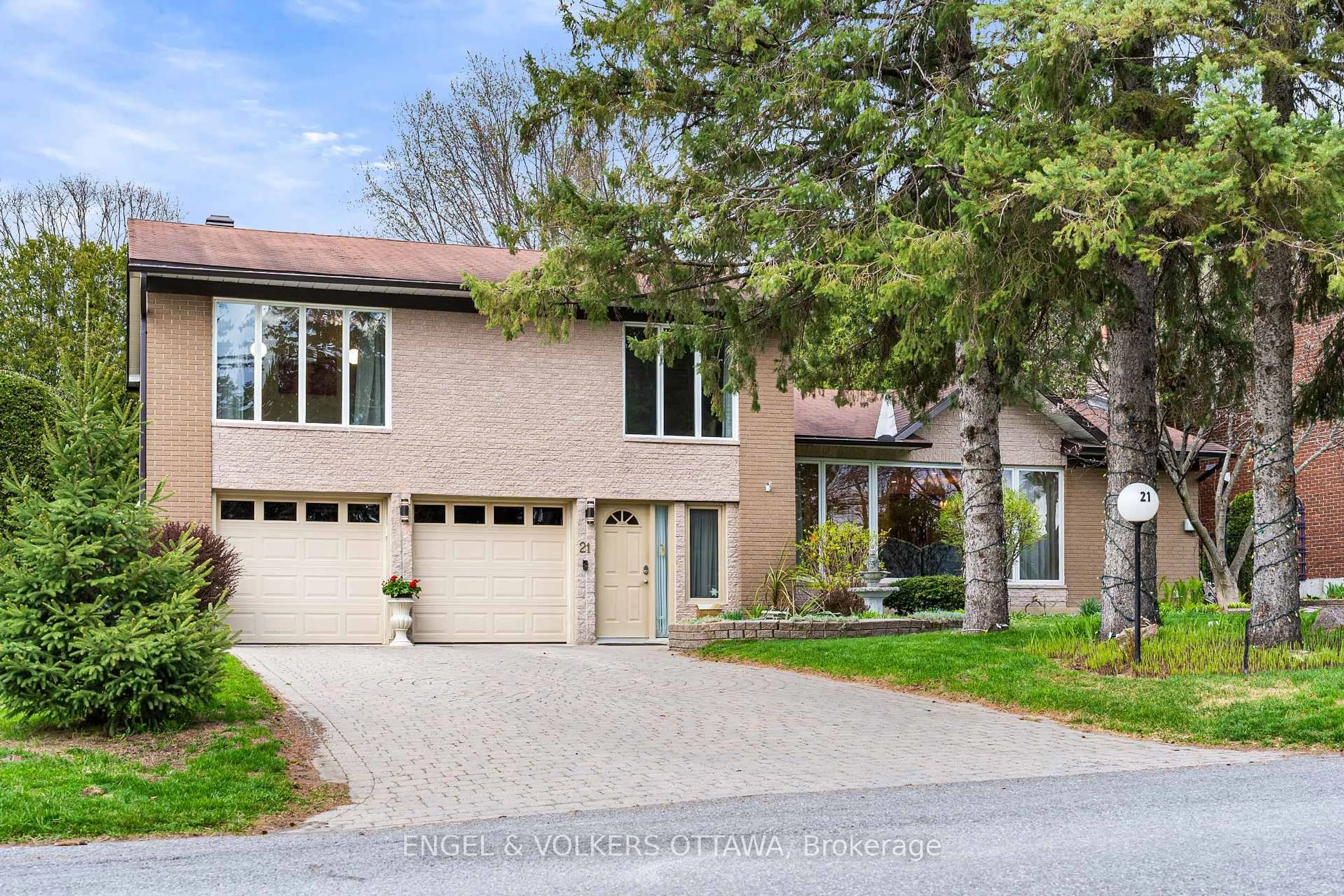 Home with brick exterior material, street for 21 Tiffany Cres, Kanata Ontario K2K 1W3