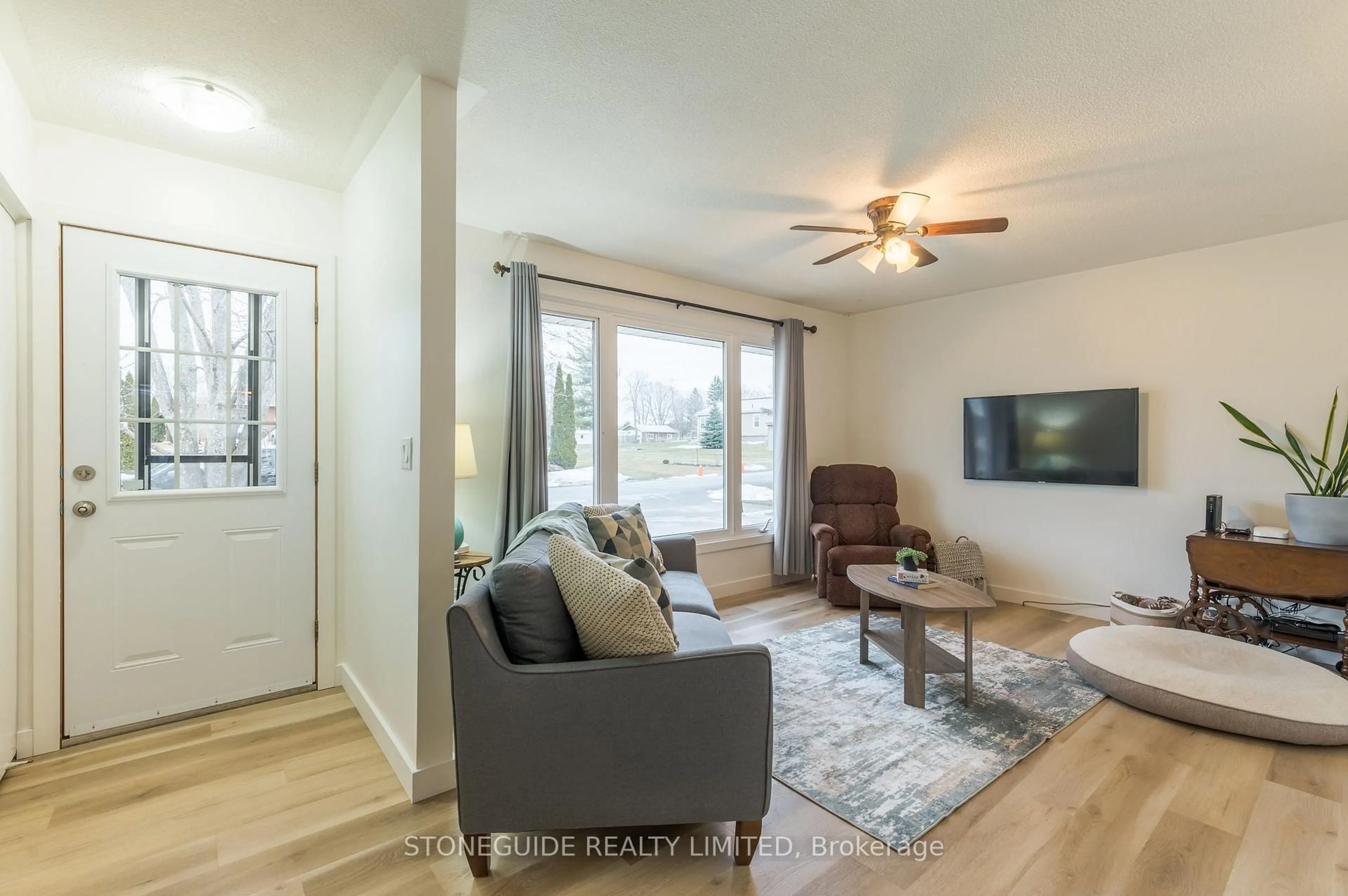 Living room with furniture, wood/laminate floor for 67 Argyle St, Trent Hills Ontario K0L 1Y0
