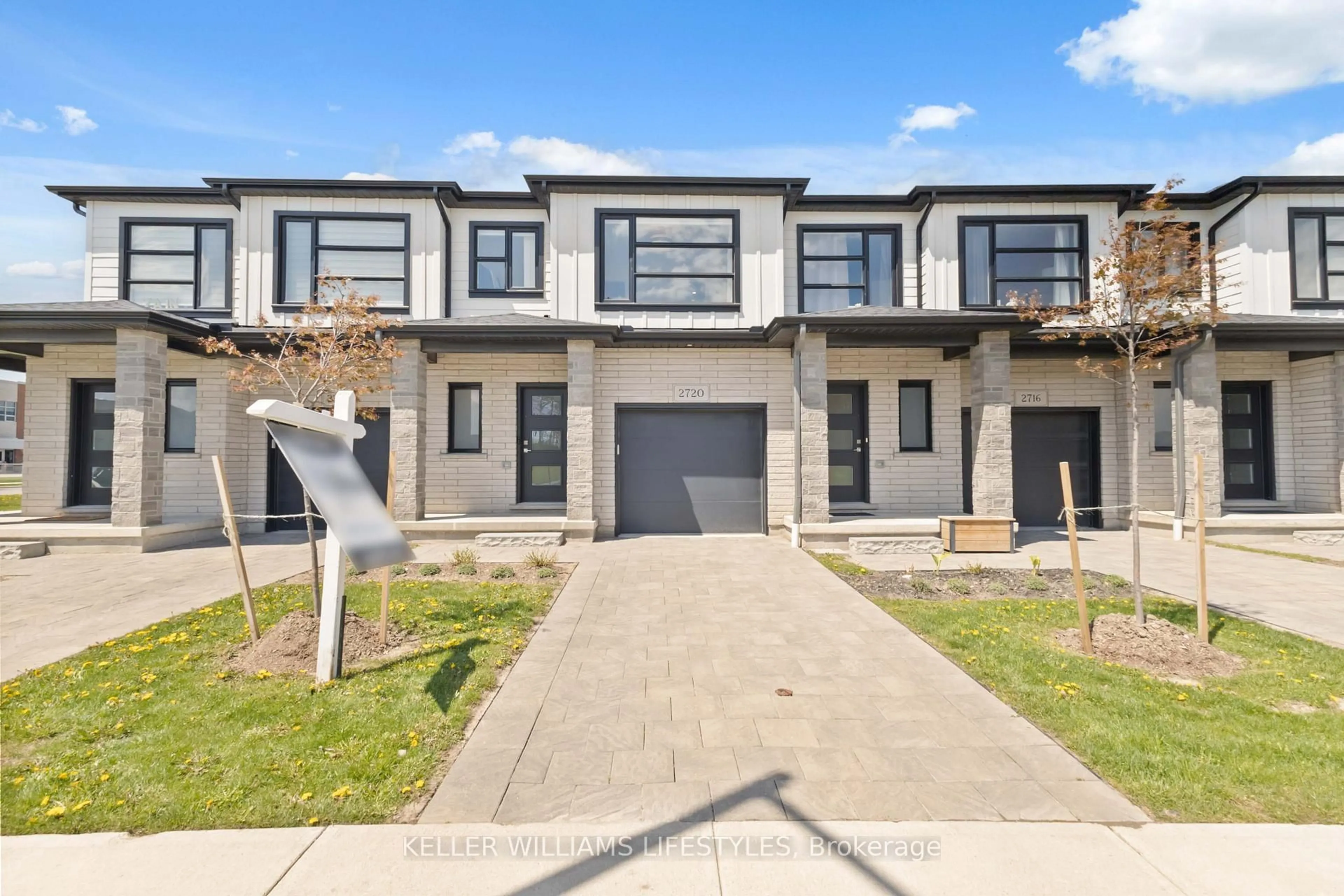 A pic from outside/outdoor area/front of a property/back of a property/a pic from drone, street for 2720 Buroak Dr #11, London North Ontario N6G 0X4