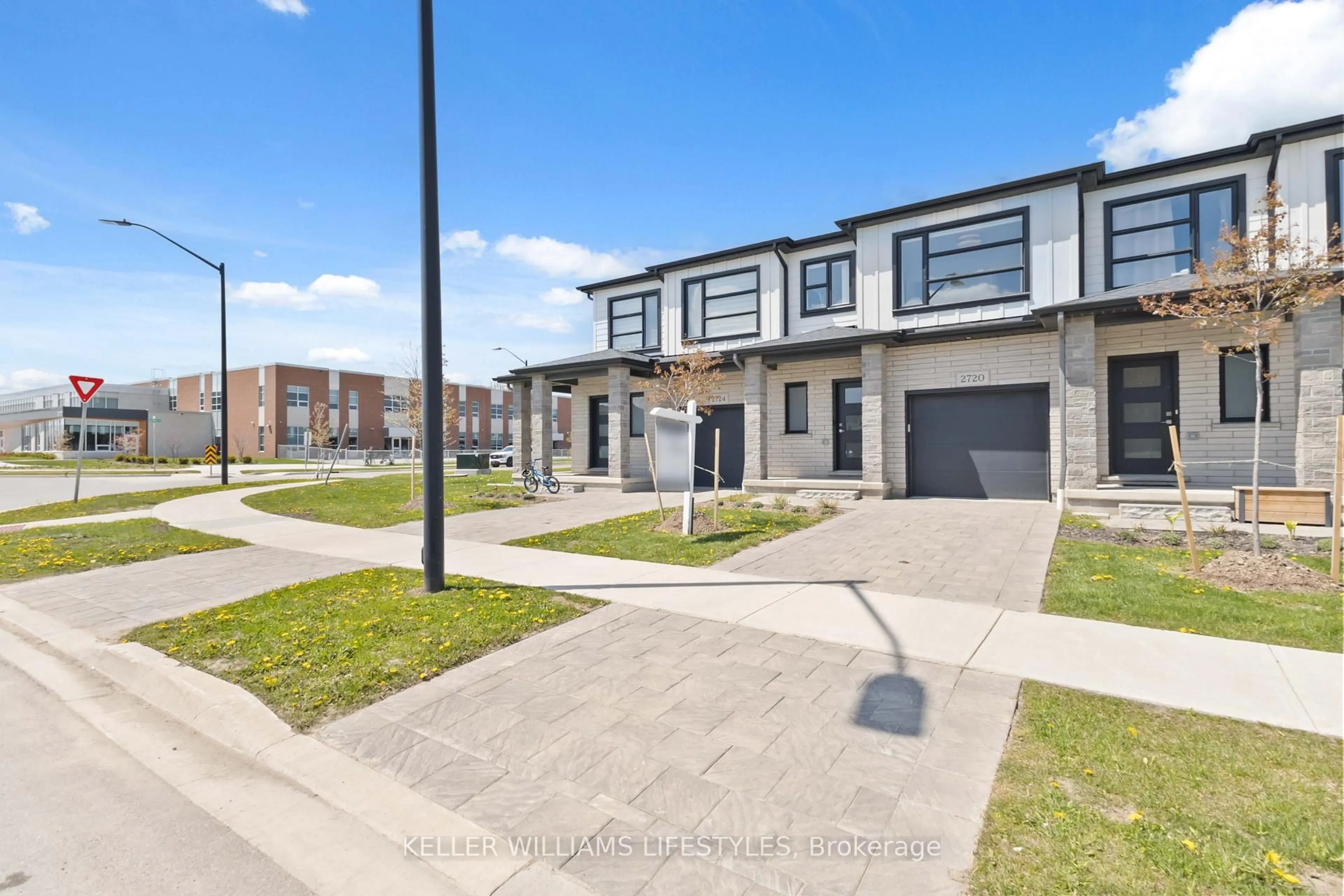 A pic from outside/outdoor area/front of a property/back of a property/a pic from drone, street for 2720 Buroak Dr #11, London North Ontario N6G 0X4