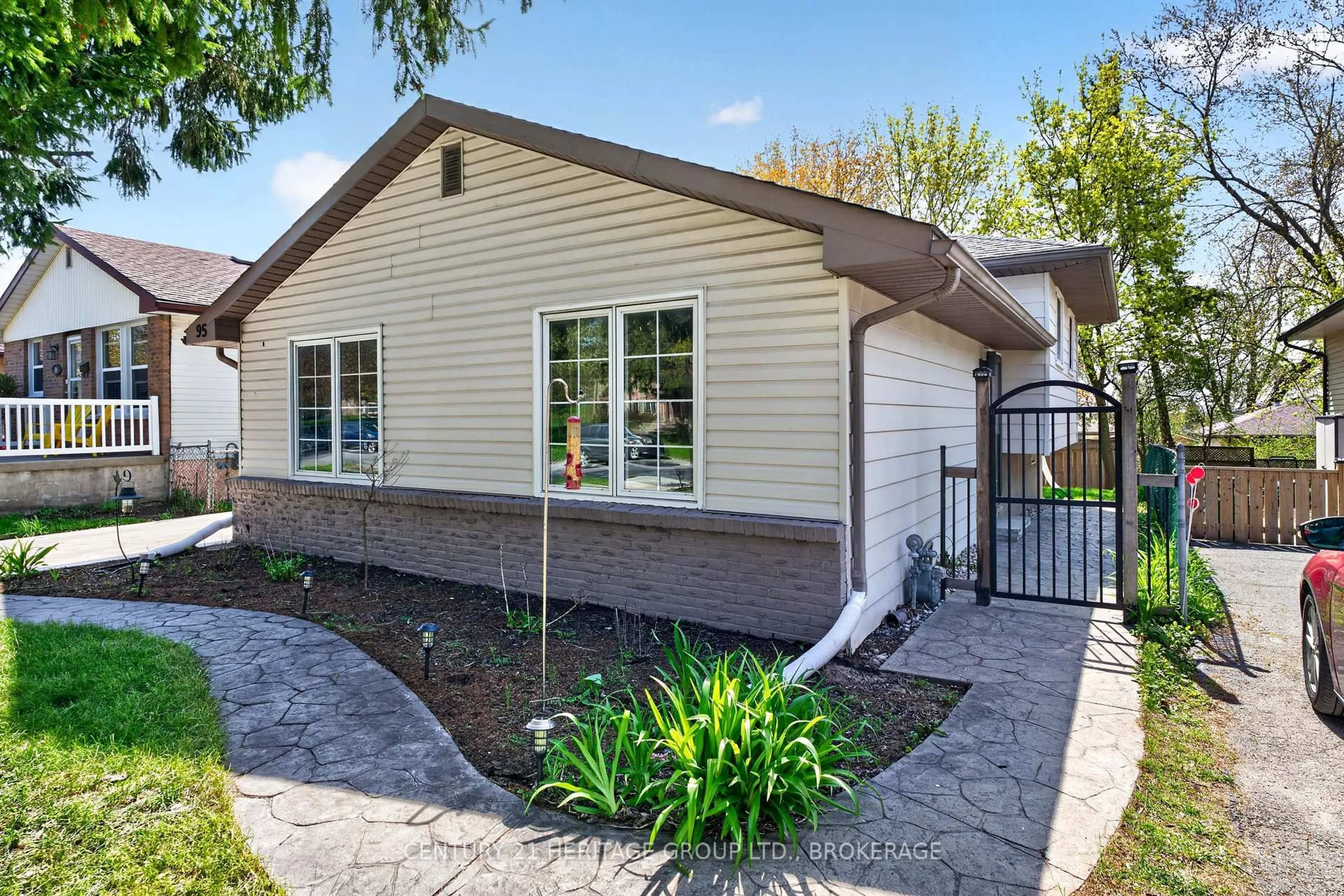 Home with vinyl exterior material, street for 95 Virginia Dr, Kingston Ontario K7K 5Y3