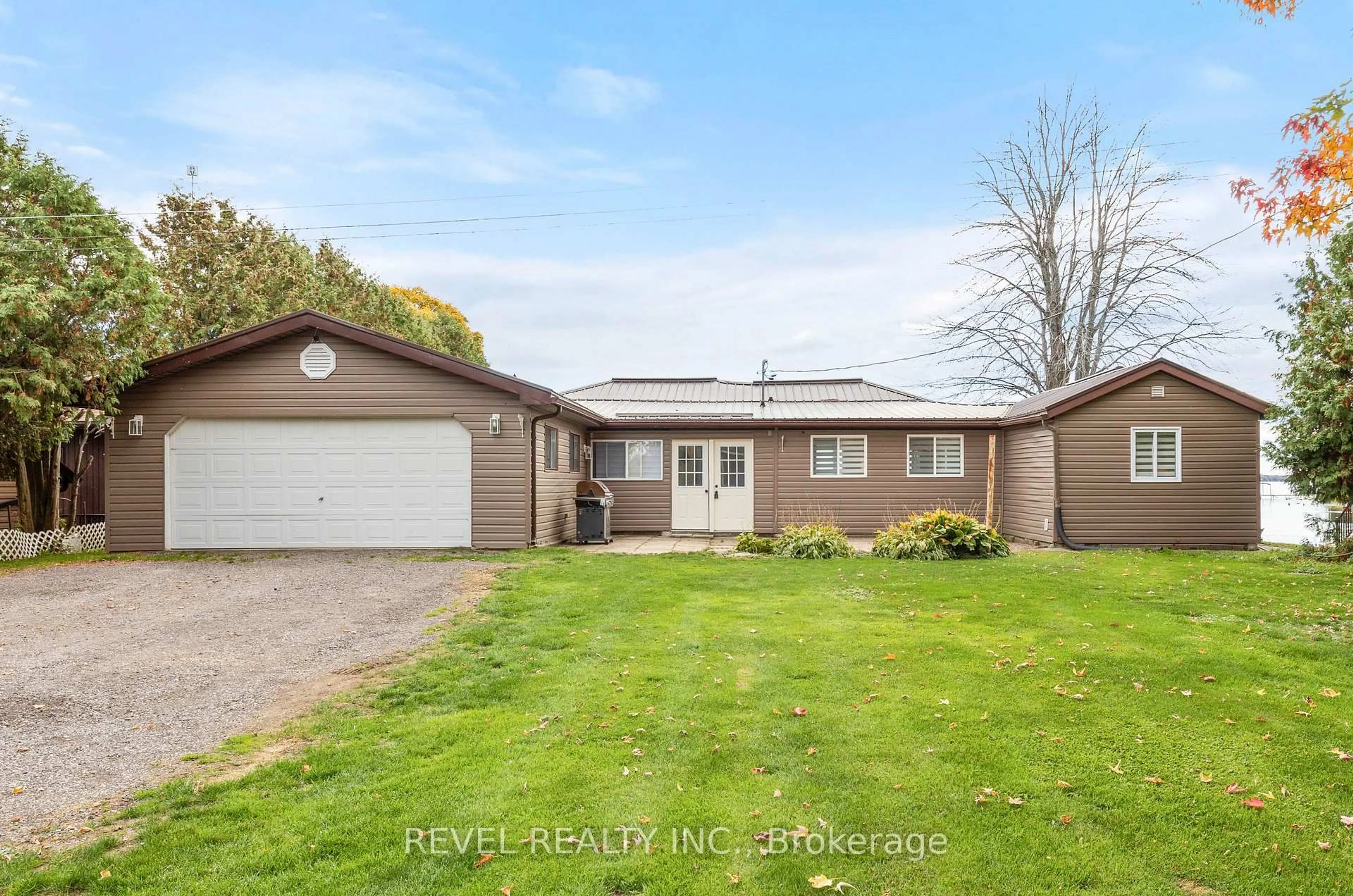 A pic from outside/outdoor area/front of a property/back of a property/a pic from drone, street for 85 Marsh Creek Rd, Kawartha Lakes Ontario K0M 2C0