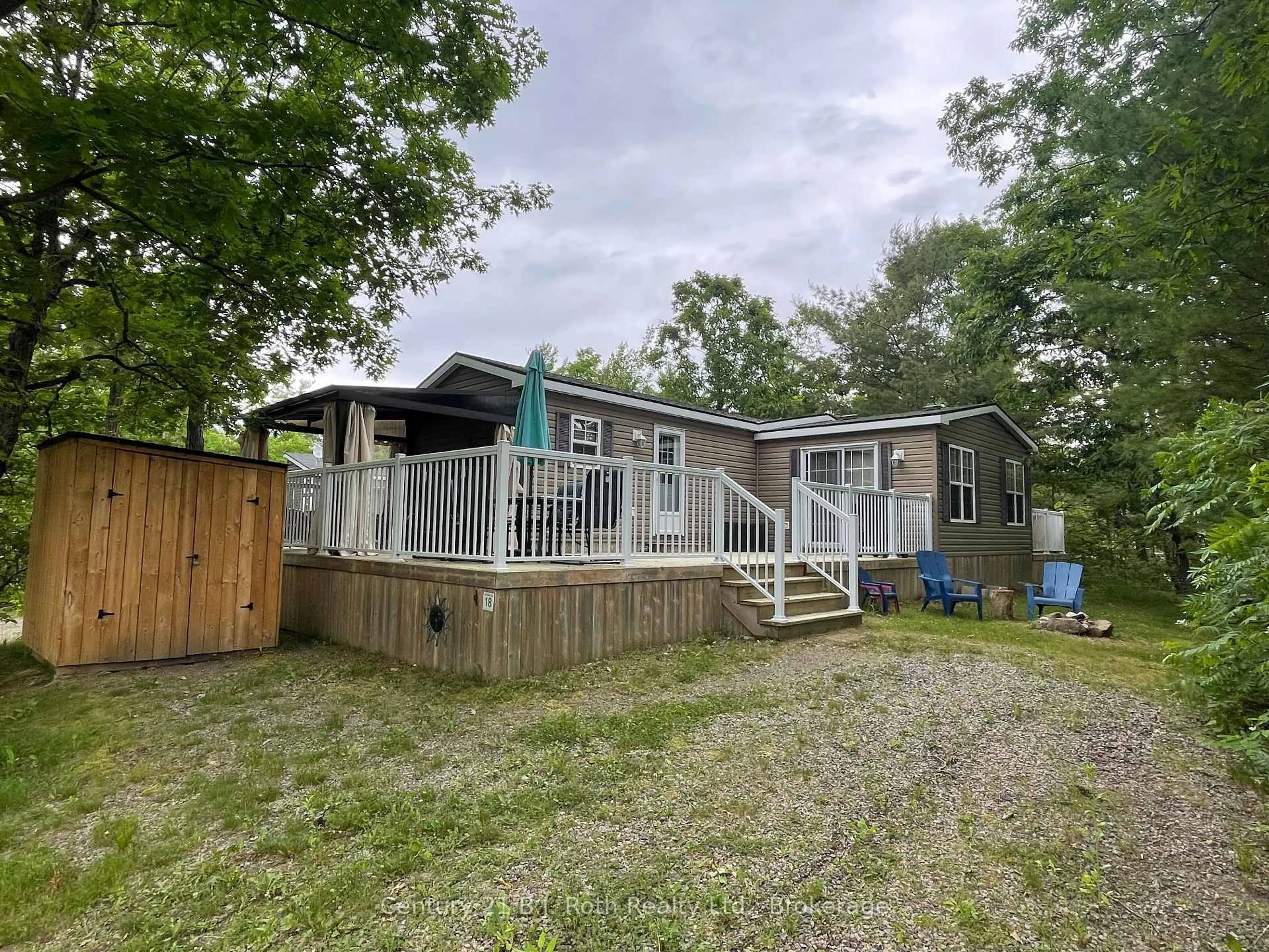 A pic from outside/outdoor area/front of a property/back of a property/a pic from drone, water/lake/river/ocean view for 1336 SOUTH MORRISON LAKE Rd #18 Morrison Creek, Gravenhurst Ontario P0B 1L0