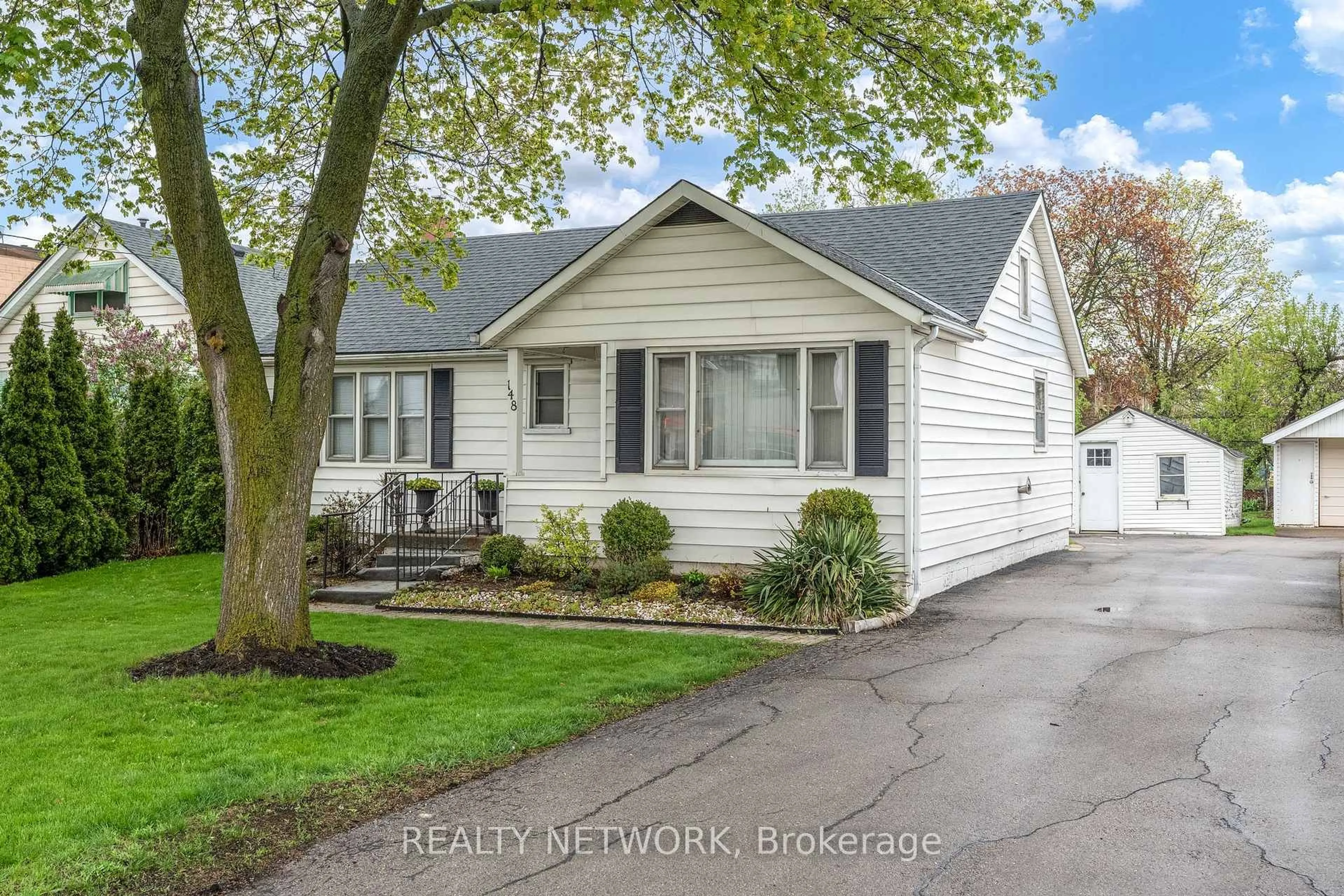 Home with vinyl exterior material, street for 148 Gray Rd, Hamilton Ontario L8G 3V2