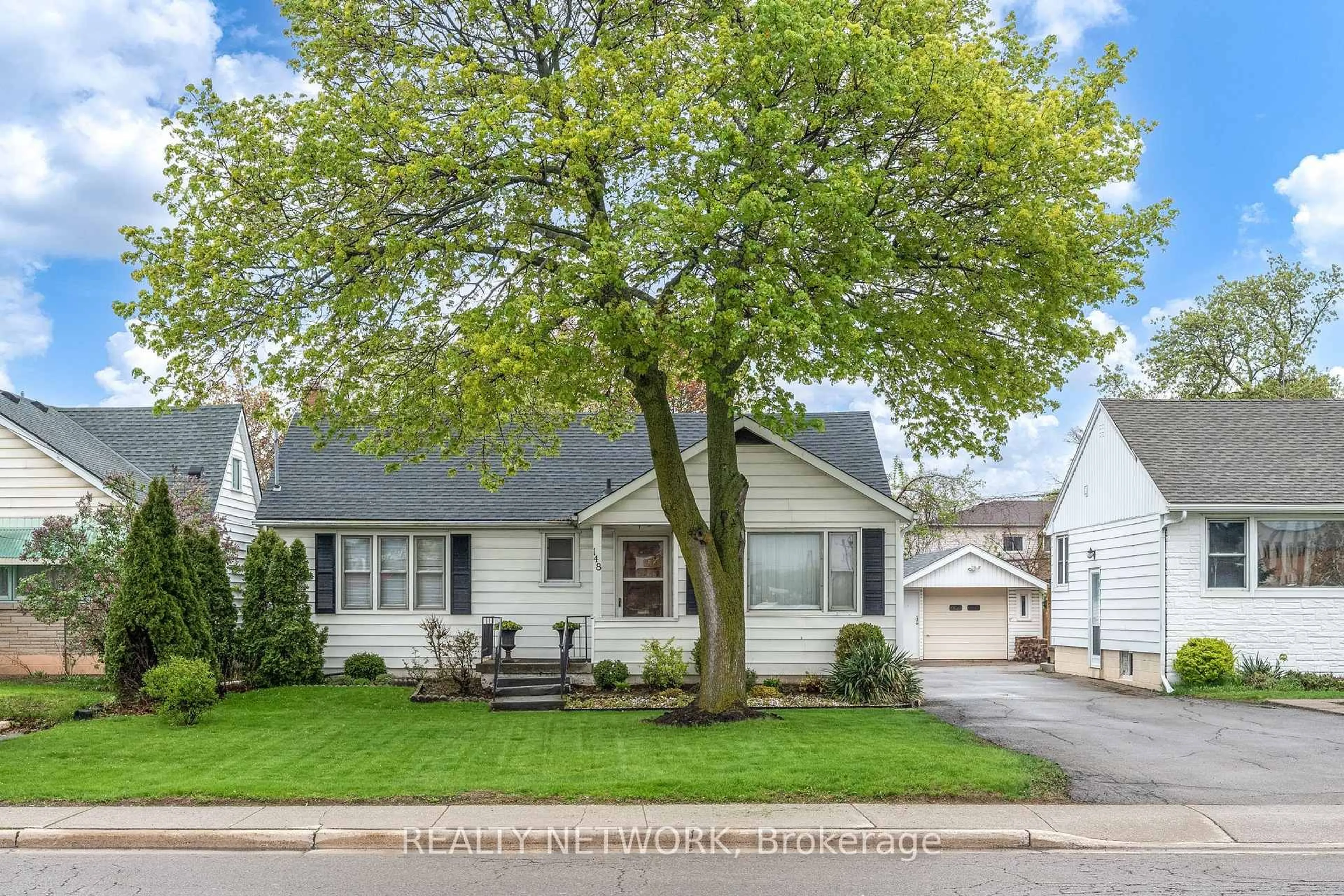 Home with vinyl exterior material, street for 148 Gray Rd, Hamilton Ontario L8G 3V2