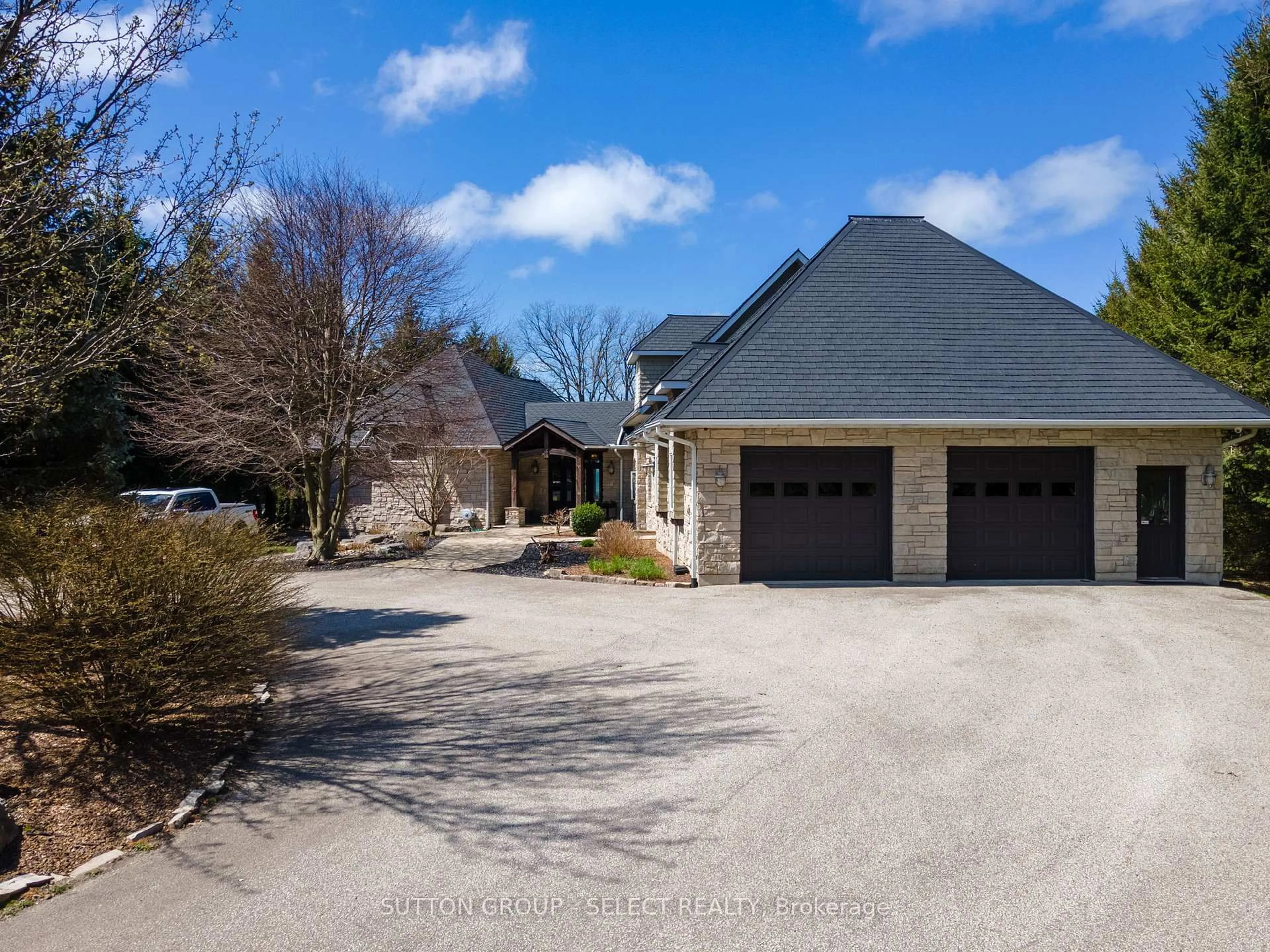 A pic from outside/outdoor area/front of a property/back of a property/a pic from drone, street for 4544 Lakeshore Rd, Plympton-Wyoming Ontario N0N 1J6