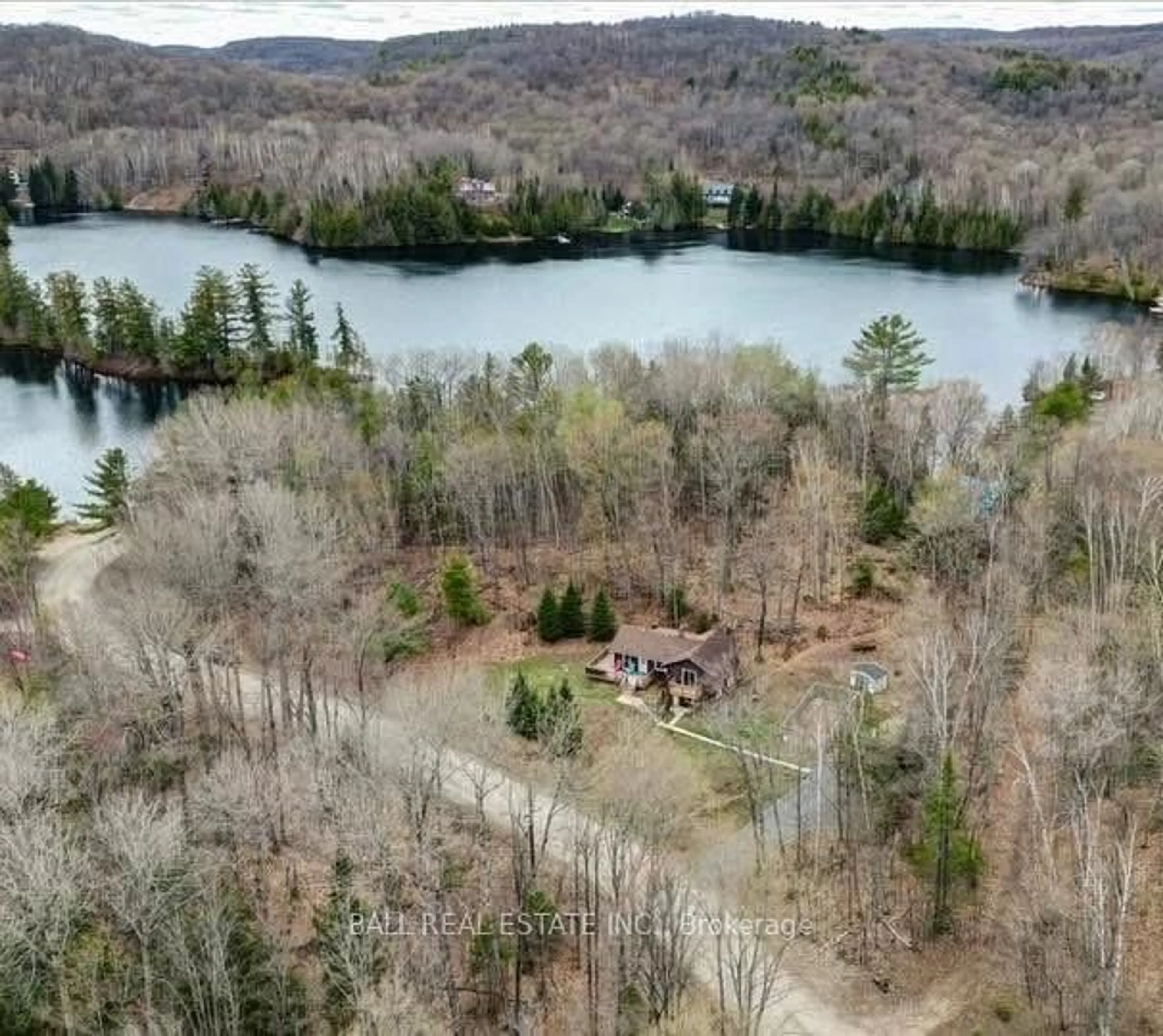 A pic from outside/outdoor area/front of a property/back of a property/a pic from drone, water/lake/river/ocean view for 164 Trout Lake Rd, Bancroft Ontario K0L 1C0