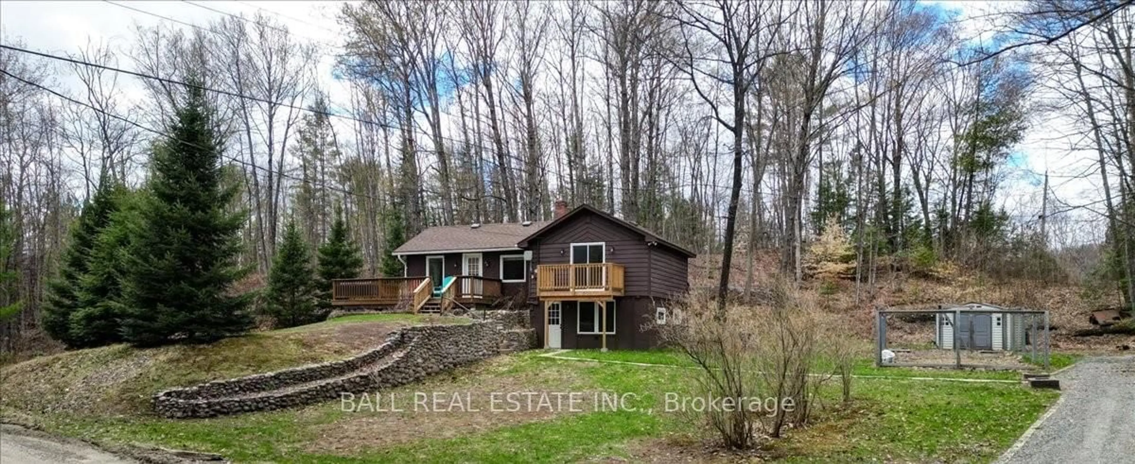 A pic from outside/outdoor area/front of a property/back of a property/a pic from drone, water/lake/river/ocean view for 164 Trout Lake Rd, Bancroft Ontario K0L 1C0