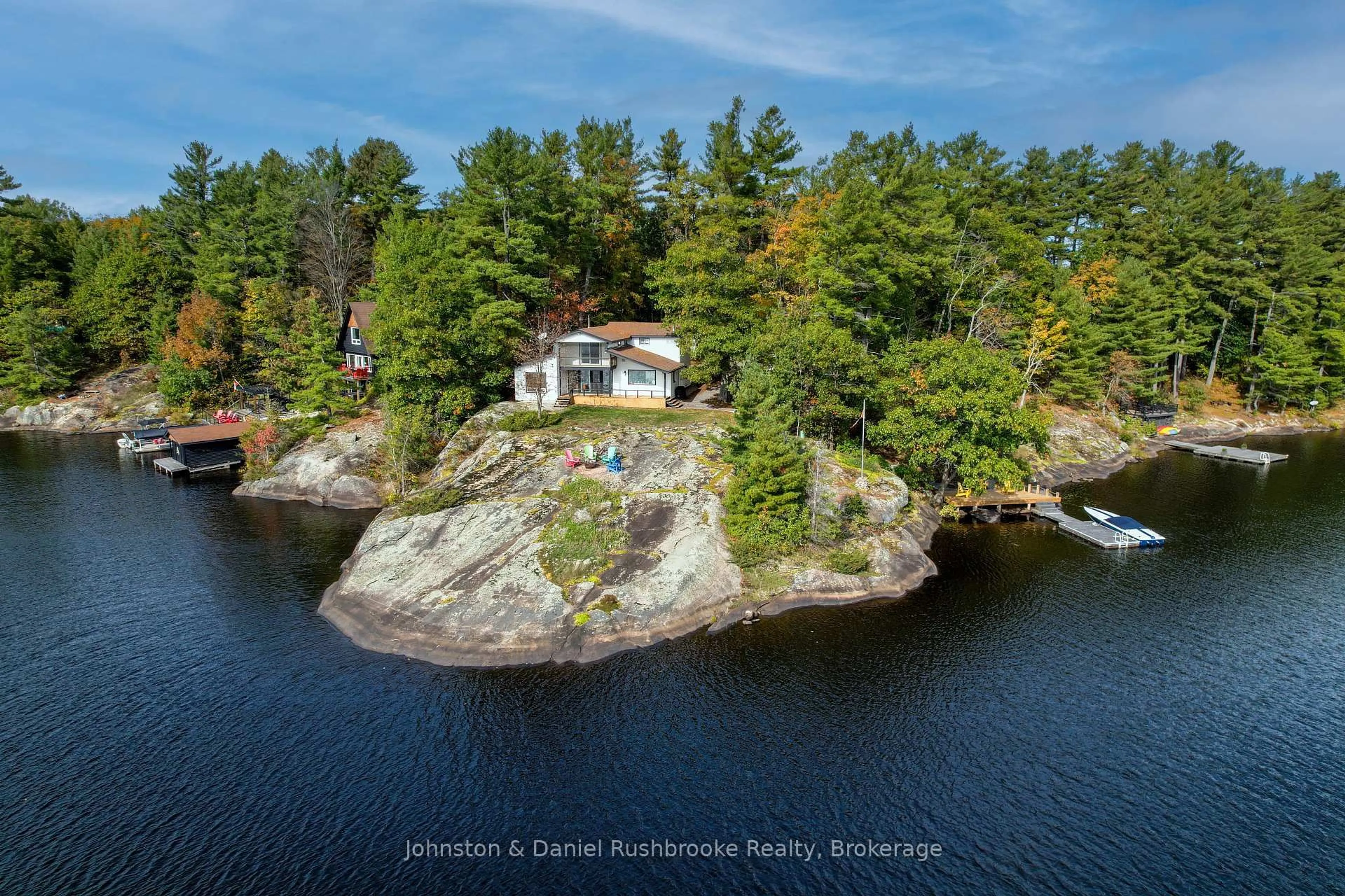 A pic from outside/outdoor area/front of a property/back of a property/a pic from drone, water/lake/river/ocean view for 1042 El-Kee Point Lane, Muskoka Lakes Ontario P0B 1J0