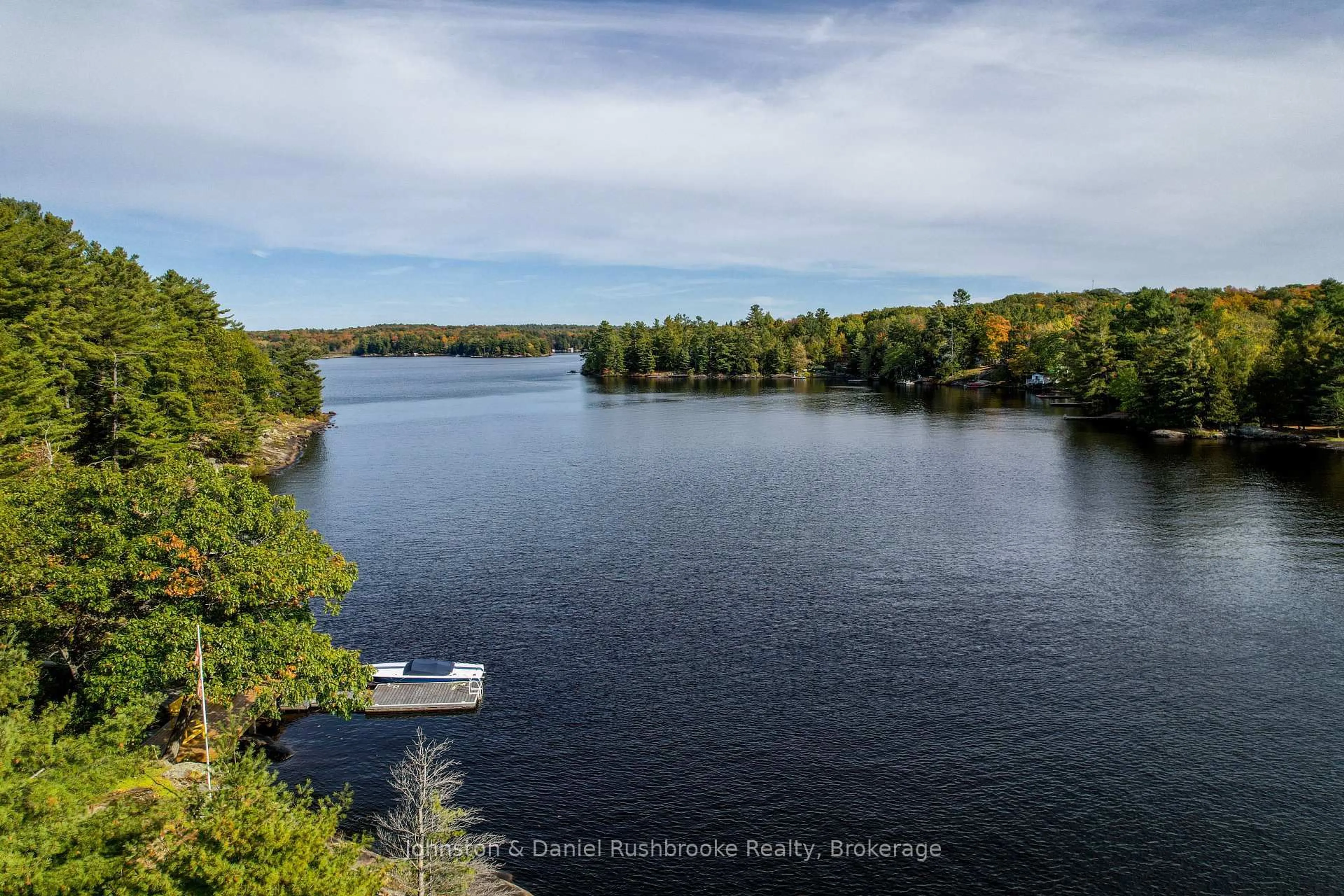 A pic from outside/outdoor area/front of a property/back of a property/a pic from drone, water/lake/river/ocean view for 1042 El-Kee Point Lane, Muskoka Lakes Ontario P0B 1J0