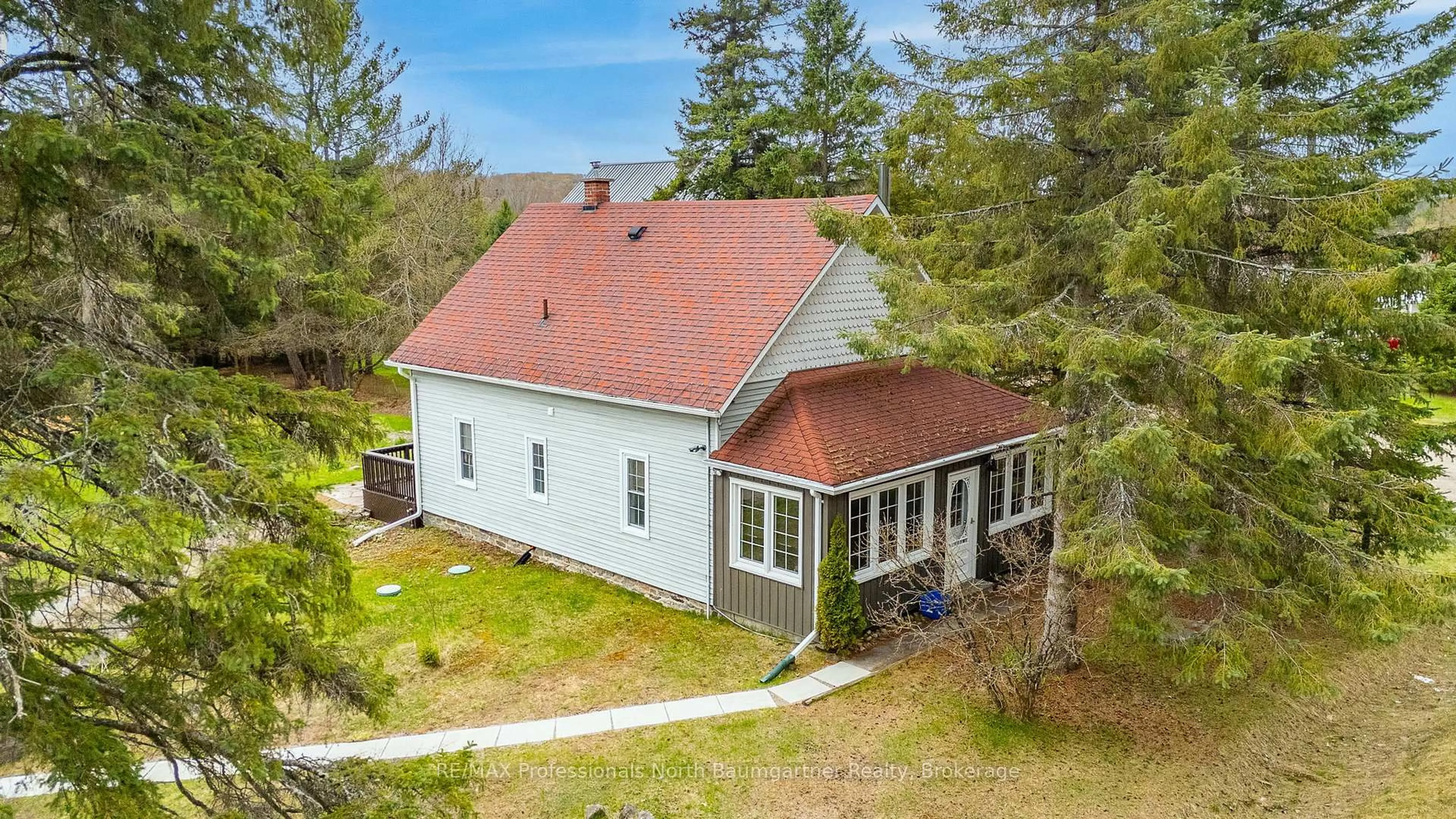 A pic from outside/outdoor area/front of a property/back of a property/a pic from drone, building for 10752 County Road 503, Highlands East Ontario K0M 1R0