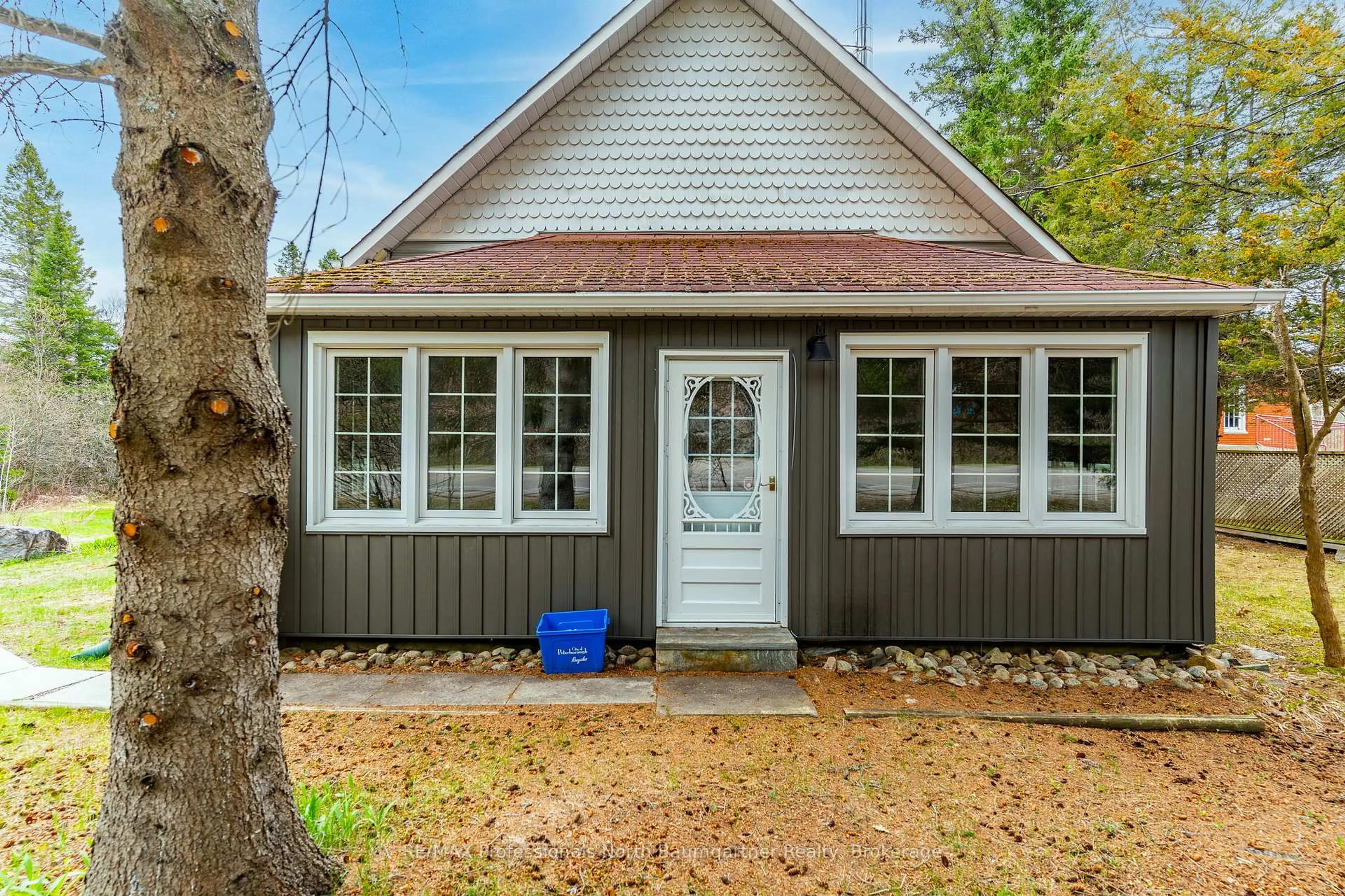 Home with vinyl exterior material, street for 10752 County Road 503, Highlands East Ontario K0M 1R0