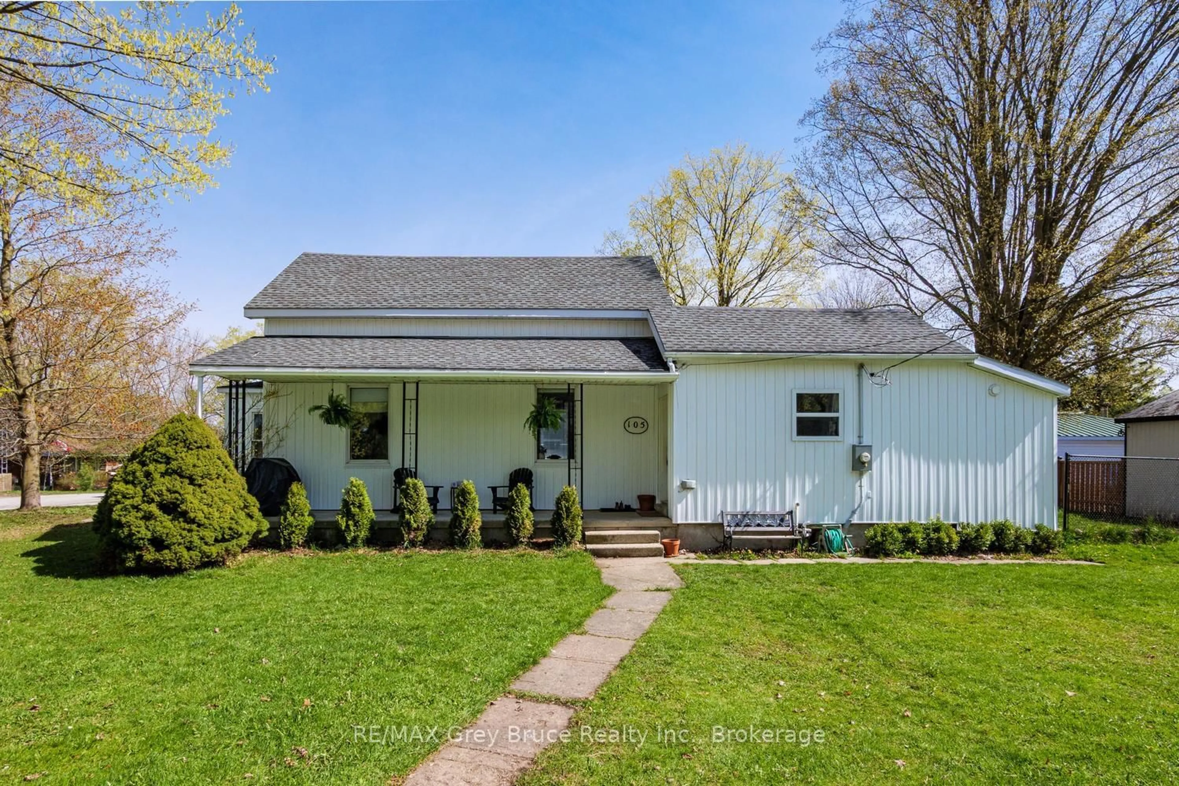 Home with vinyl exterior material, street for 105 Main St, Arran-Elderslie Ontario N0H 2N0