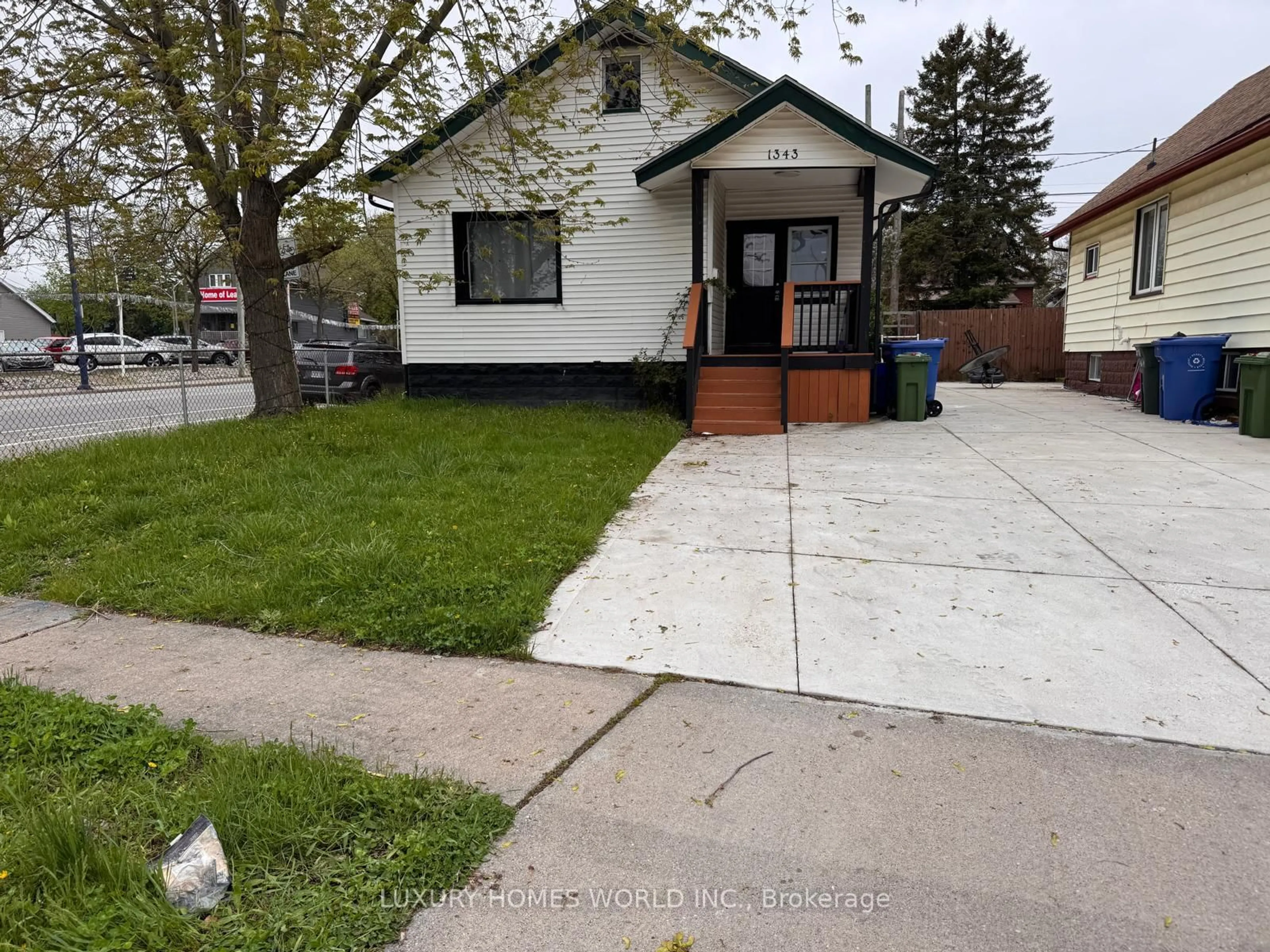 A pic from outside/outdoor area/front of a property/back of a property/a pic from drone, street for 1343 Lillian Ave, Windsor Ontario N8X 4A4