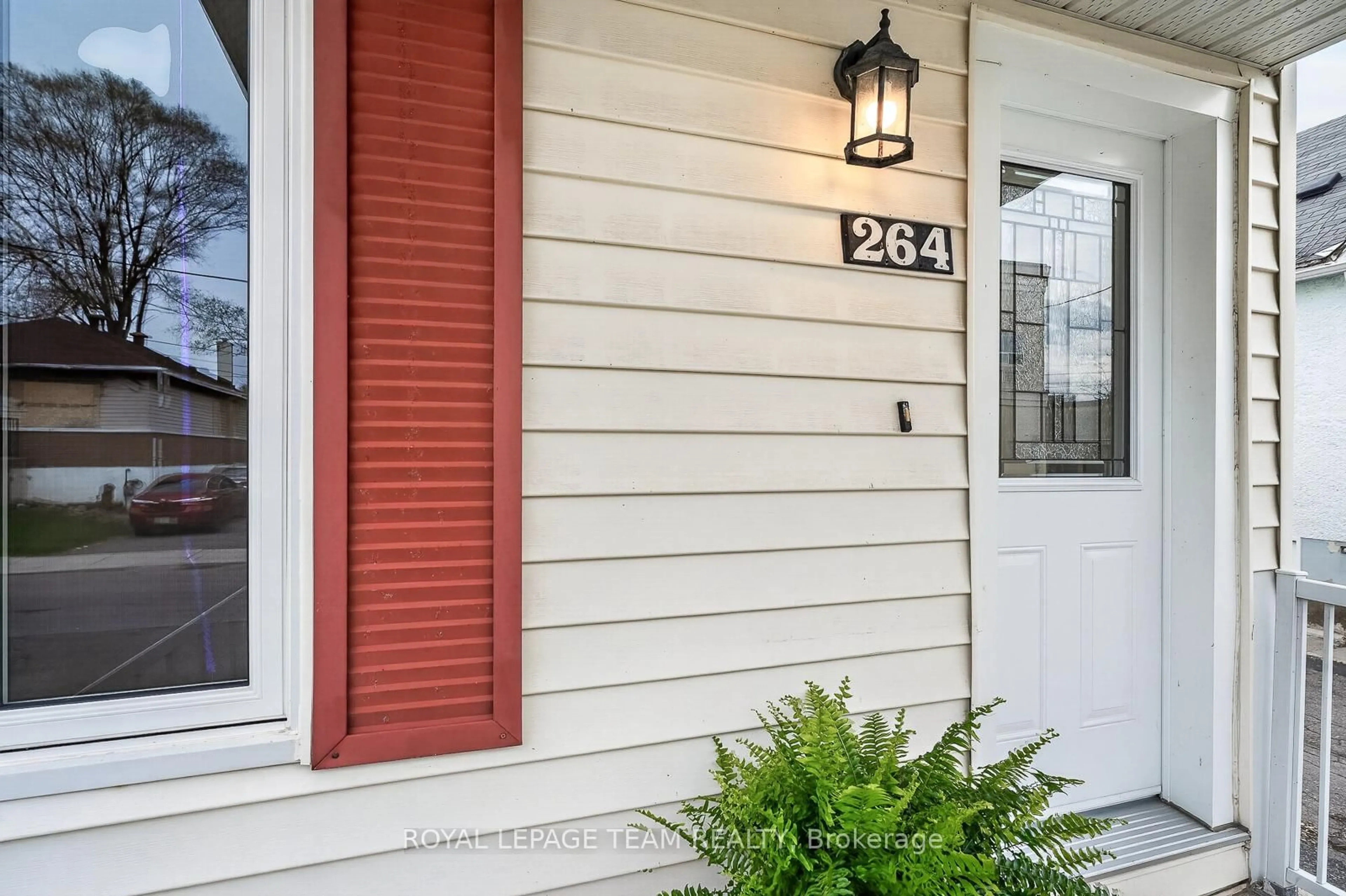 Home with vinyl exterior material, street for 264 Ste Anne Ave, Ottawa Ontario K1L 7C4