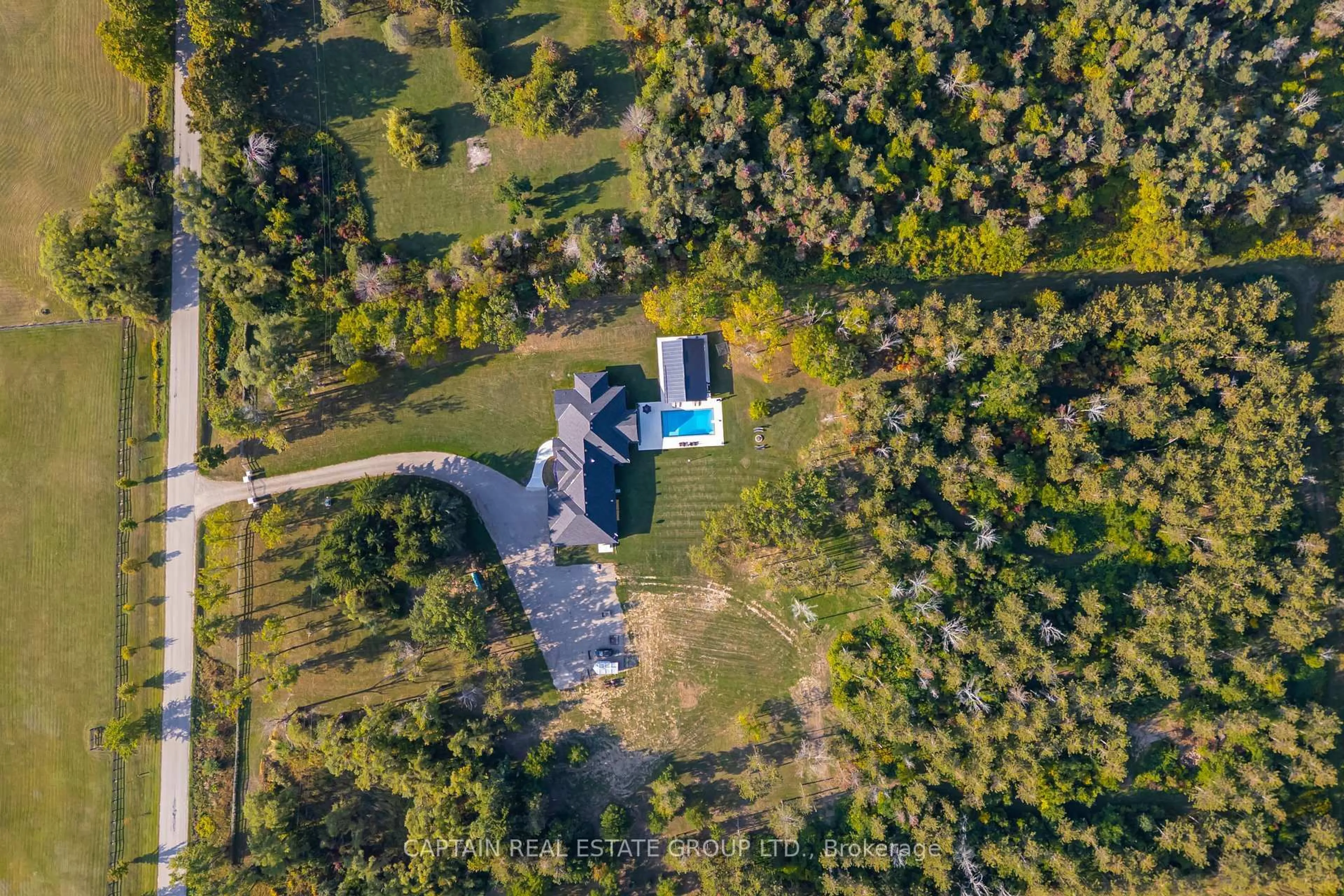 A pic from outside/outdoor area/front of a property/back of a property/a pic from drone, unknown for 836059 4th Line, Mulmur Ontario L9V 0J1