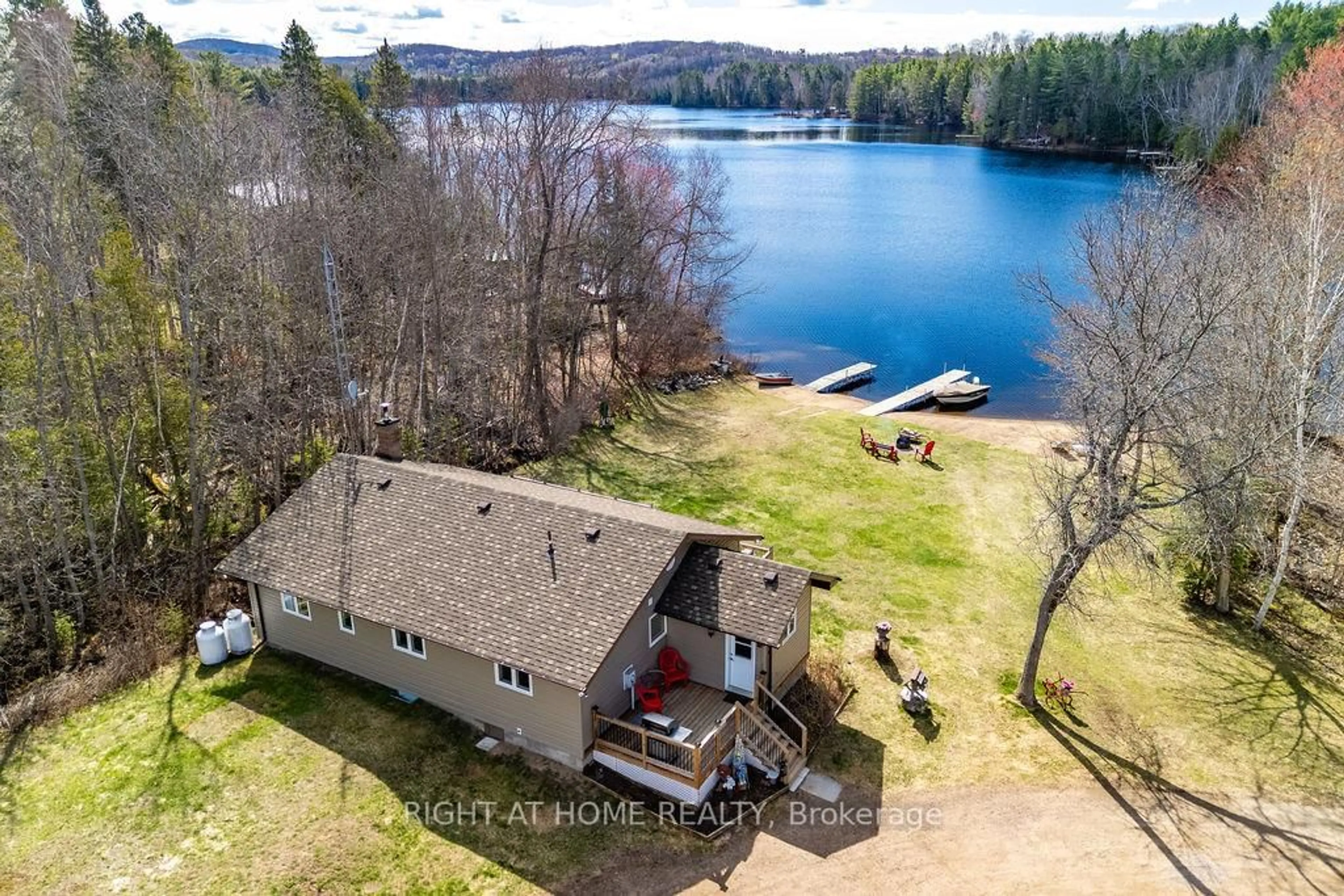 A pic from outside/outdoor area/front of a property/back of a property/a pic from drone, water/lake/river/ocean view for 61C Blackfish Bay Rd Rd, Combermere Ontario K0J 1L0