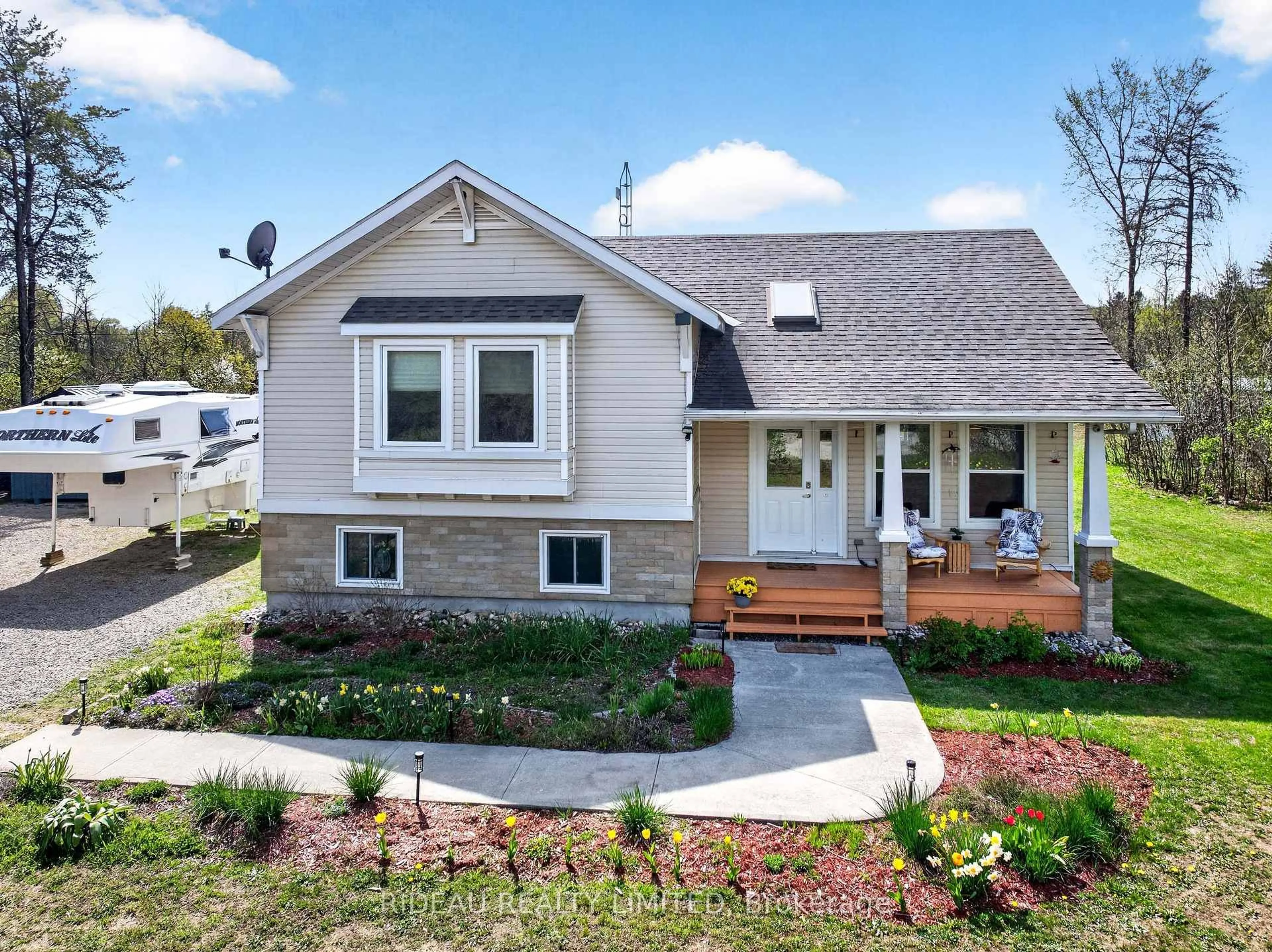 Home with vinyl exterior material, street for 44 Blanchards Hill Rd, Rideau Lakes Ontario K0G 1L0