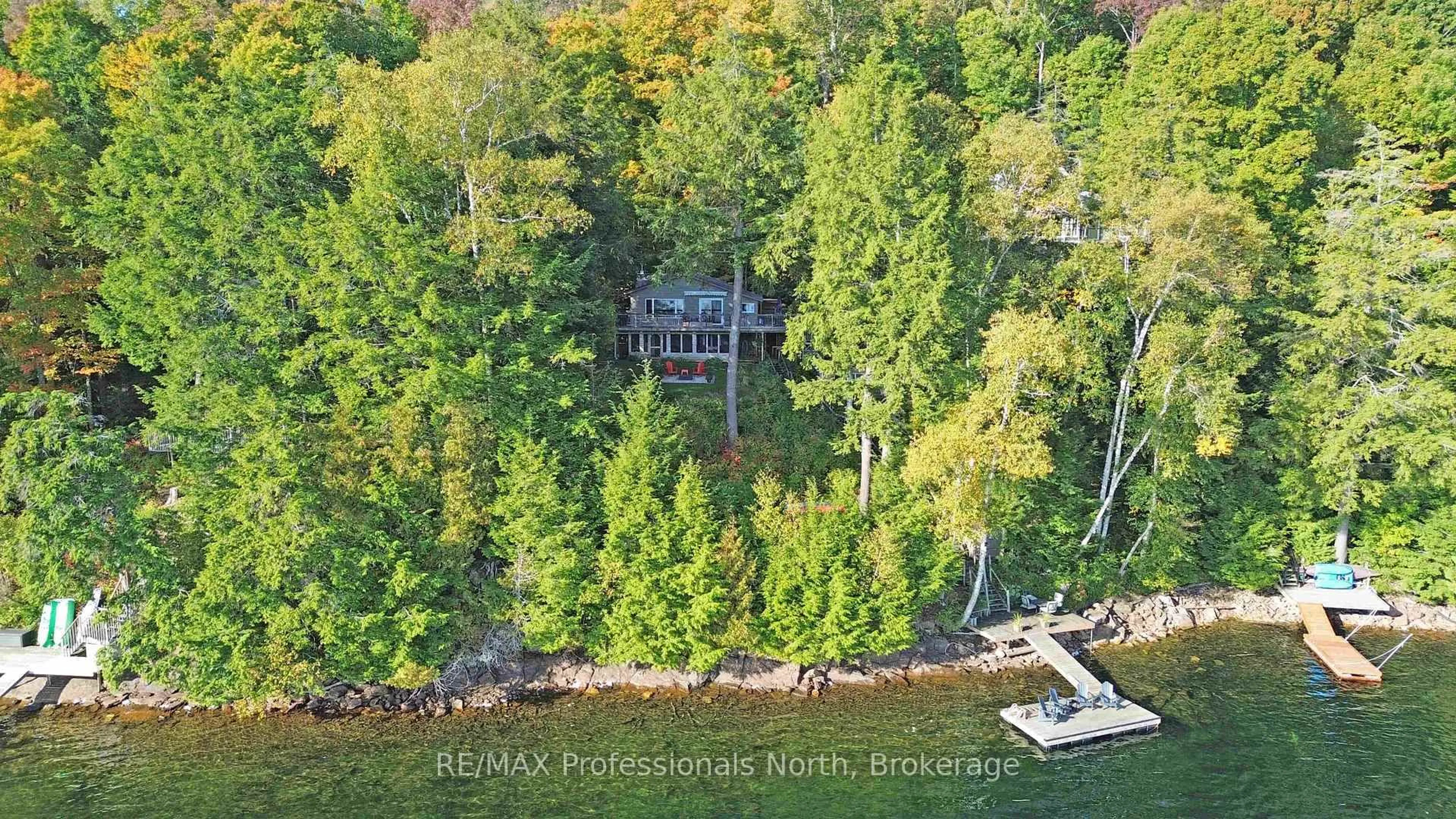 A pic from outside/outdoor area/front of a property/back of a property/a pic from drone, water/lake/river/ocean view for 1110 Miskwabi Lake Rd, Dysart et al Ontario K0M 1S0