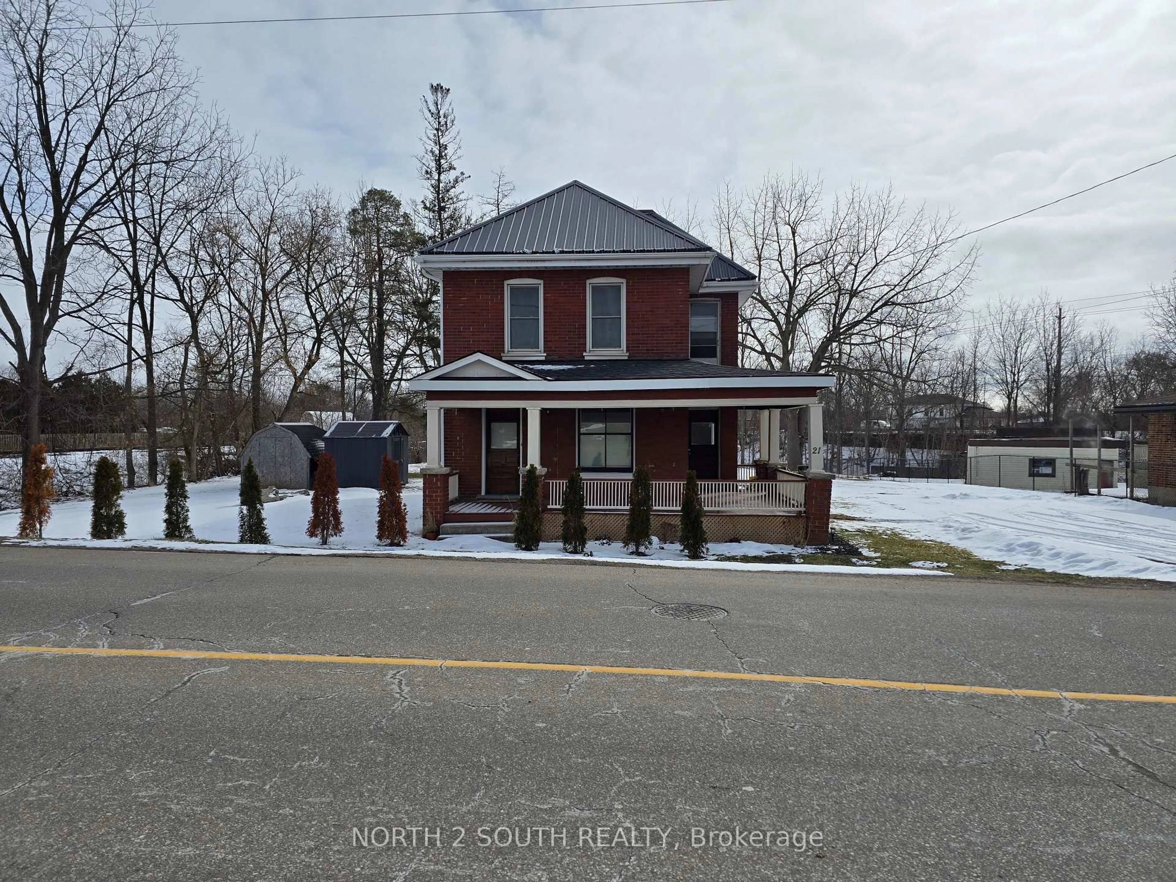A pic from outside/outdoor area/front of a property/back of a property/a pic from drone, street for 21 Johnson Rd, Brantford Ontario N3S 7E8