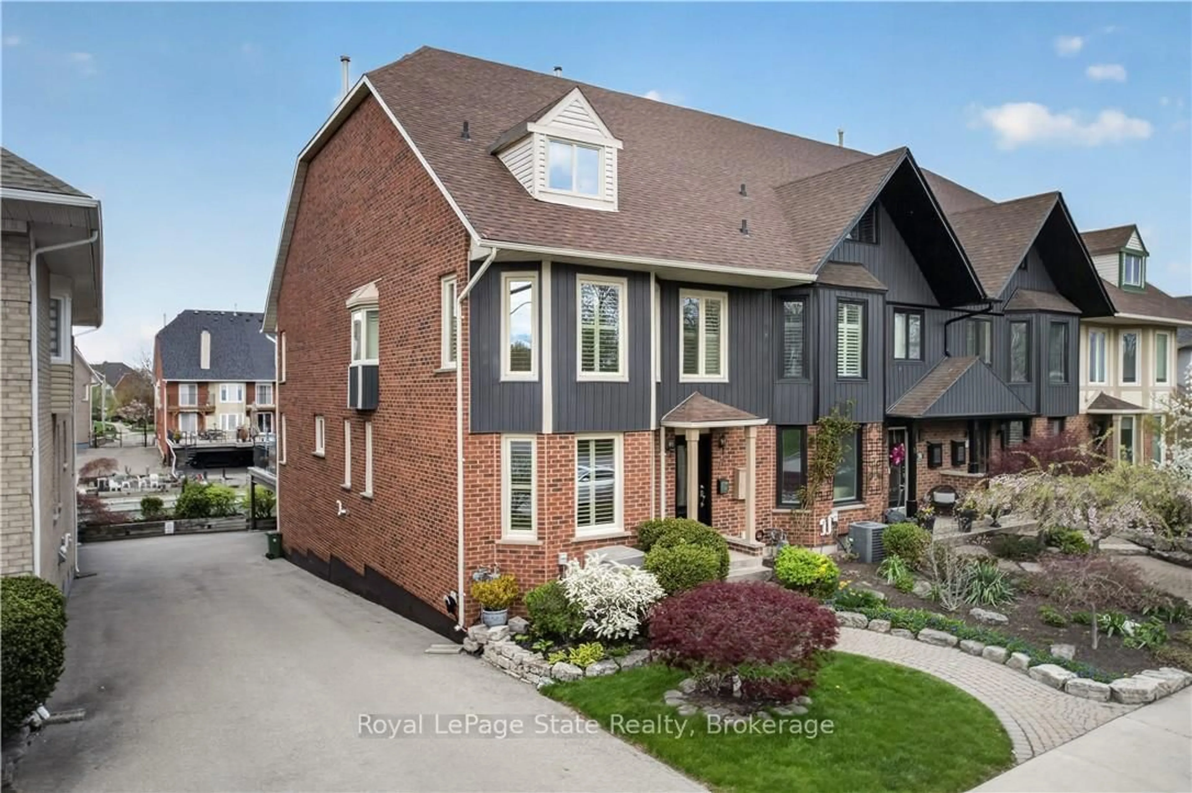Home with brick exterior material, street for 77 Sunvale Pl, Hamilton Ontario L8E 4Z6
