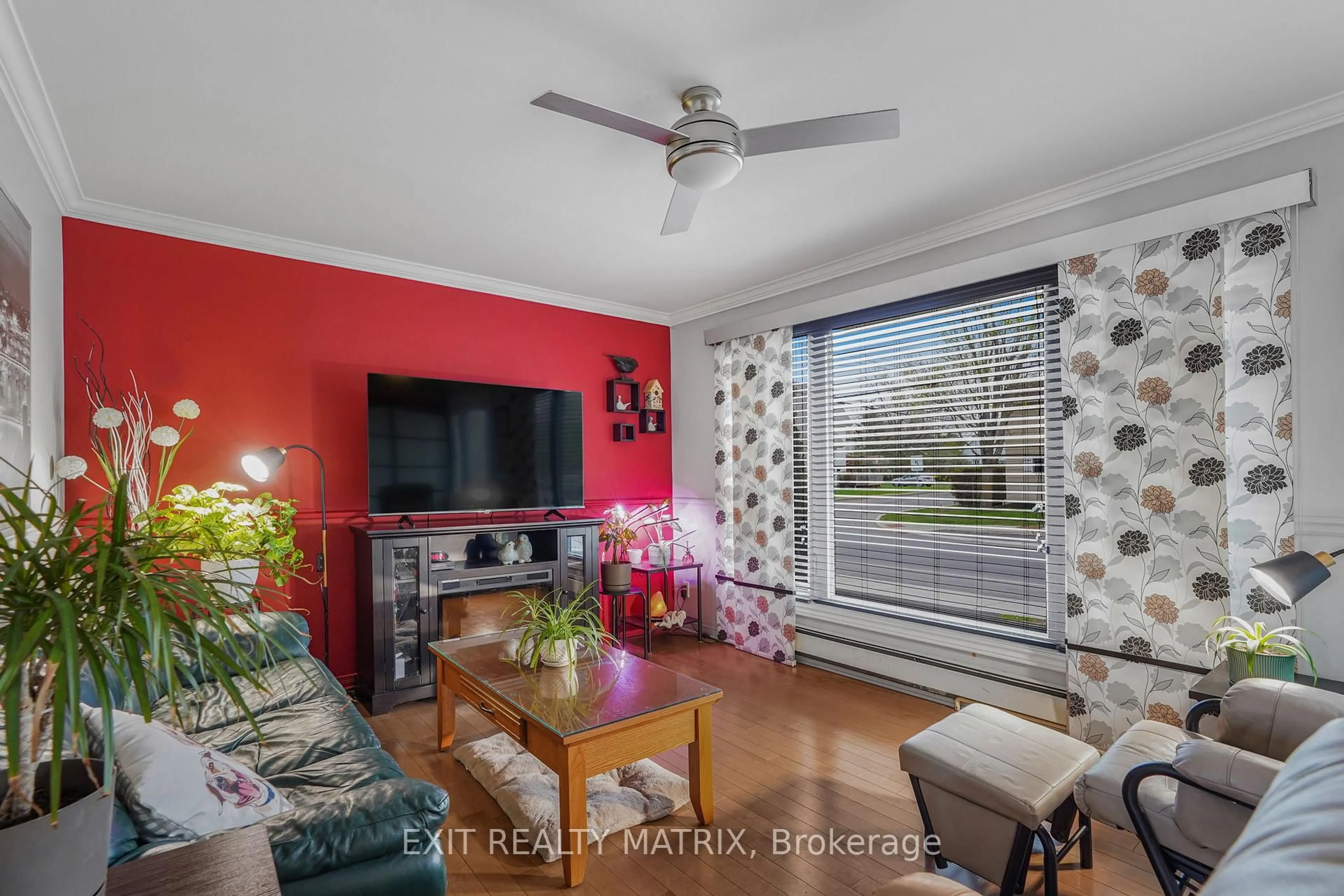 Living room with furniture, wood/laminate floor for 916 King St St, Champlain Ontario K0B 1K0