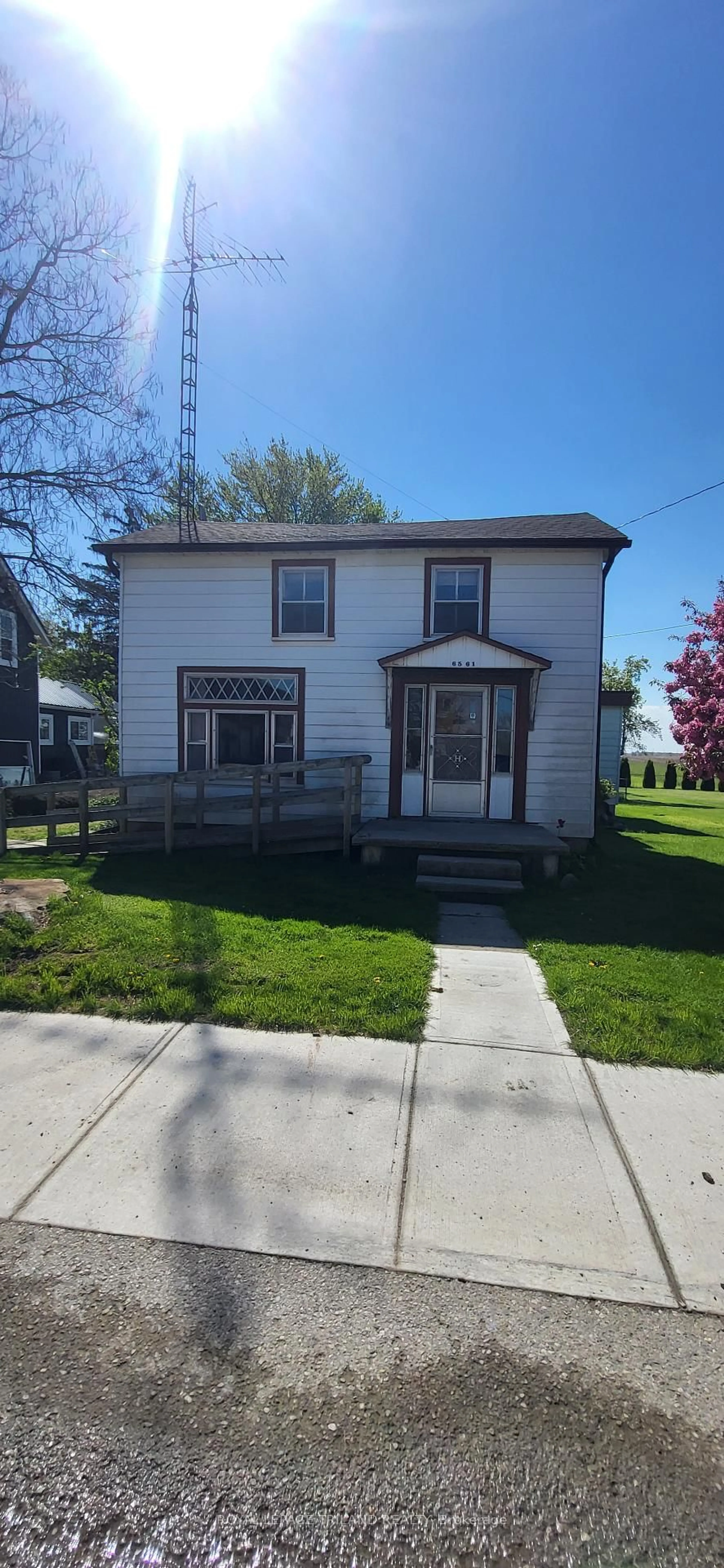 Home with vinyl exterior material, street for 6561 Longwoods Rd, Southwest Middlesex Ontario N0L 1T0